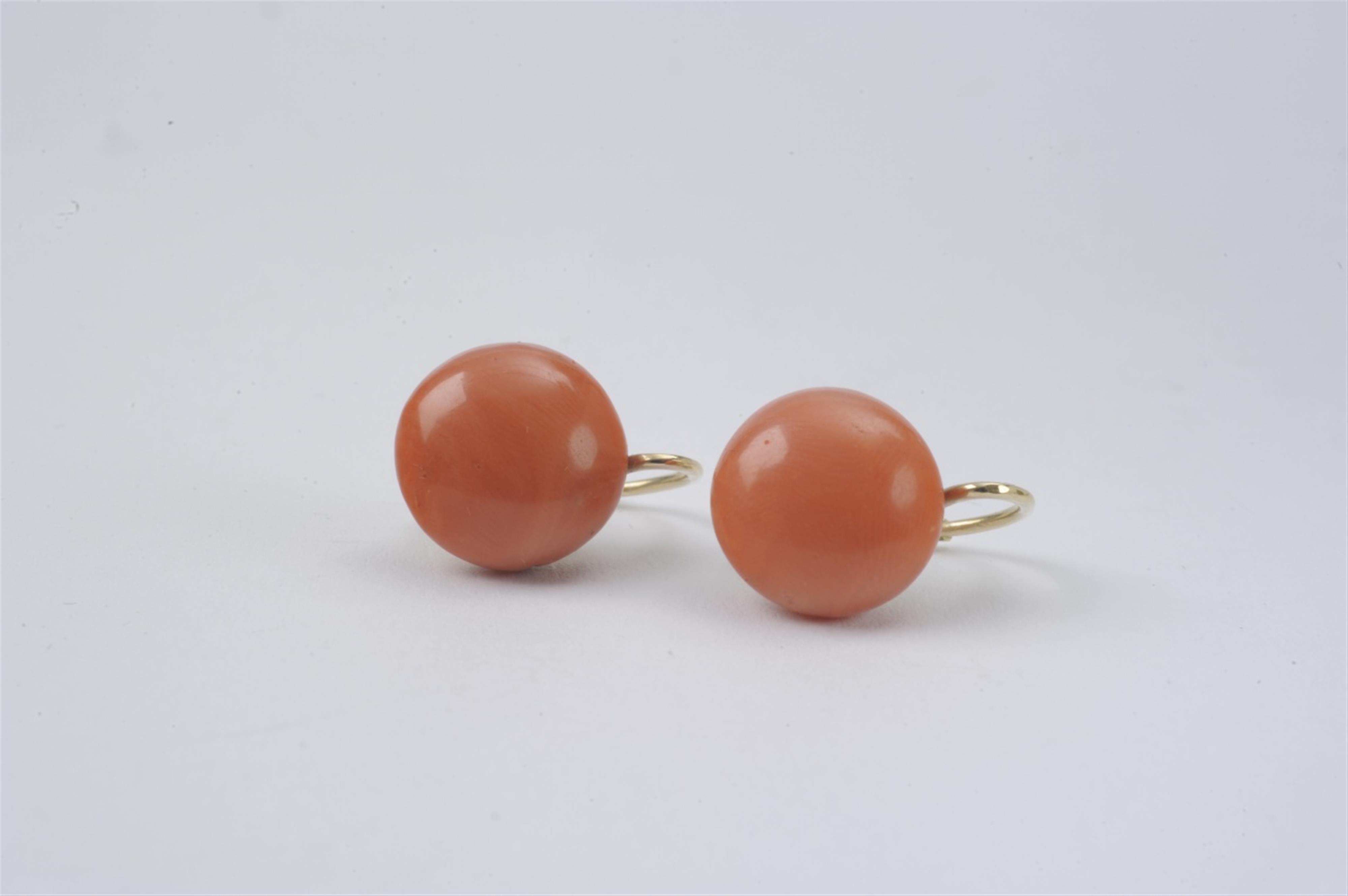 A pair of 14k gold and coral earrings - image-1