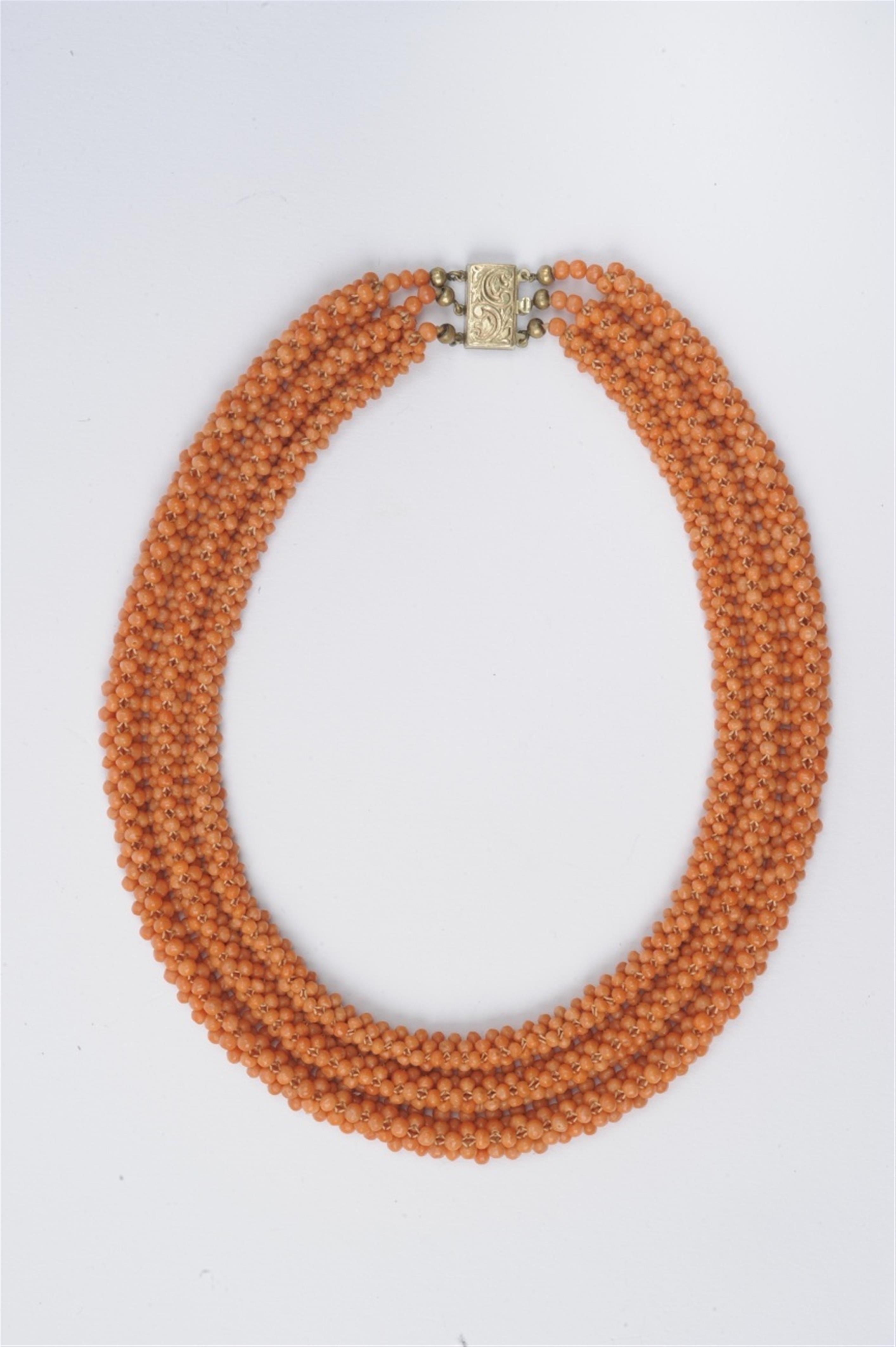 A gilt metal and coral necklace - image-1
