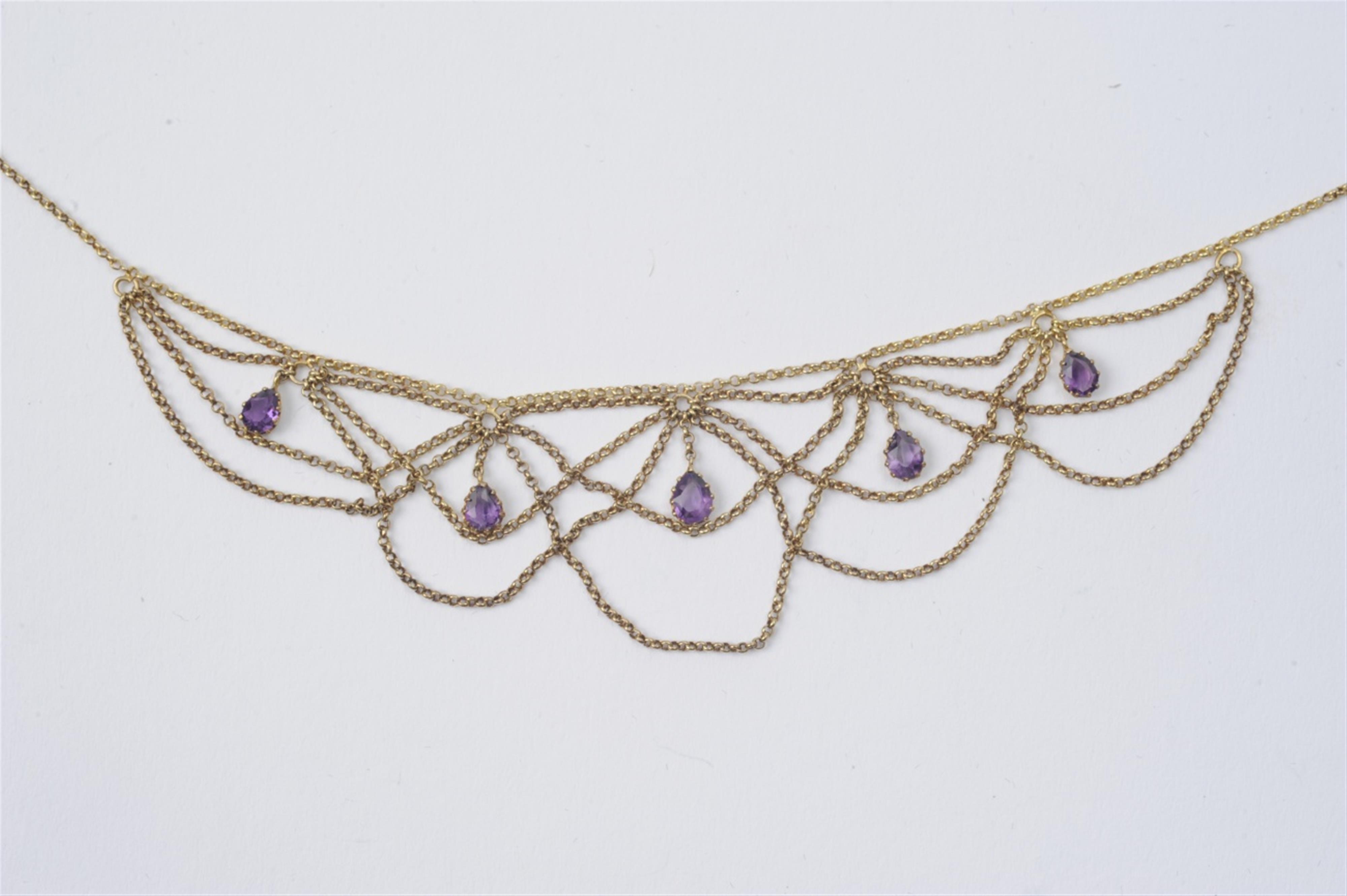 A 14k gold and amethyst festoon collier - image-1