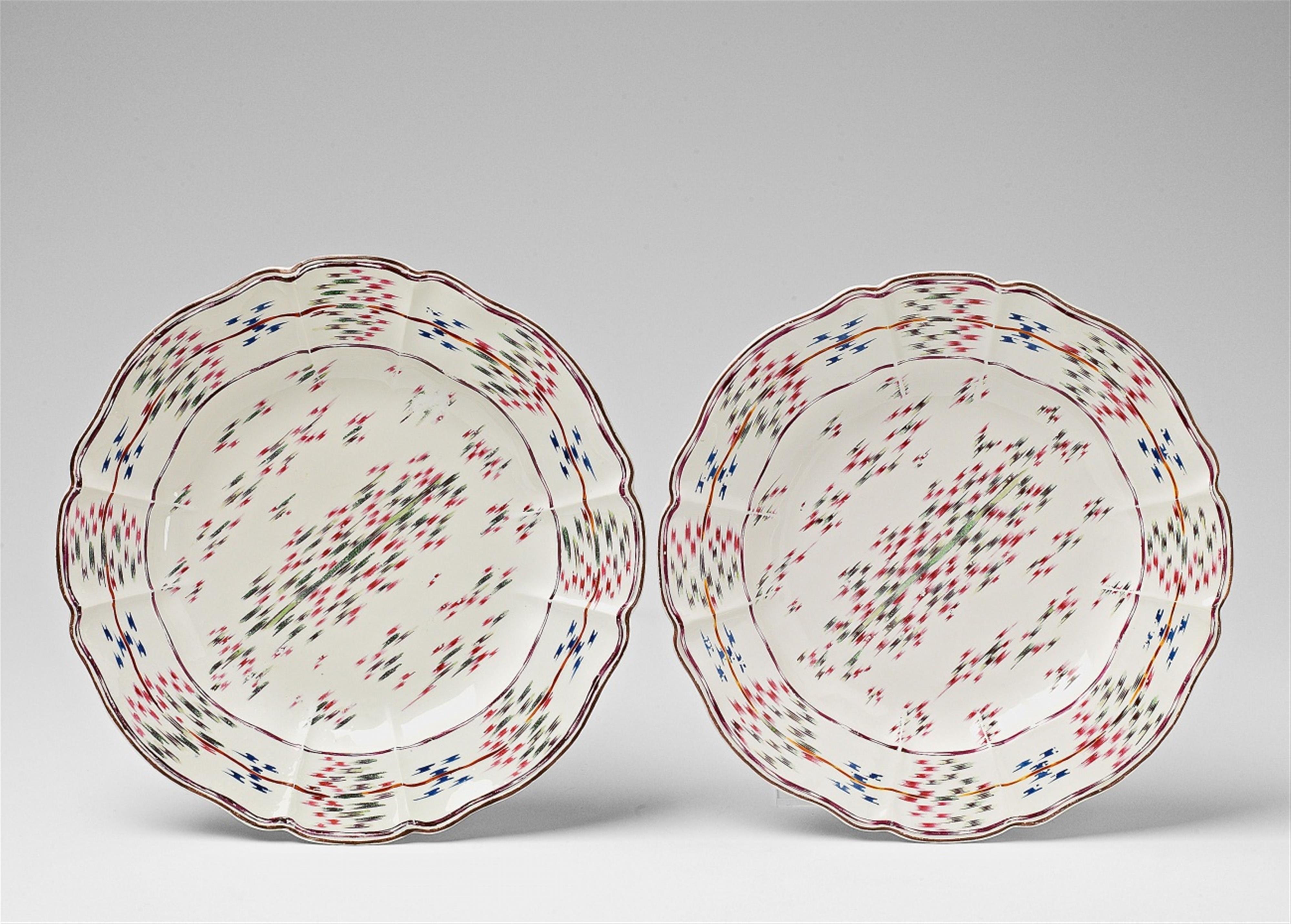 A pair of Nymphenburg porcelain plates with Atlas decor - image-1