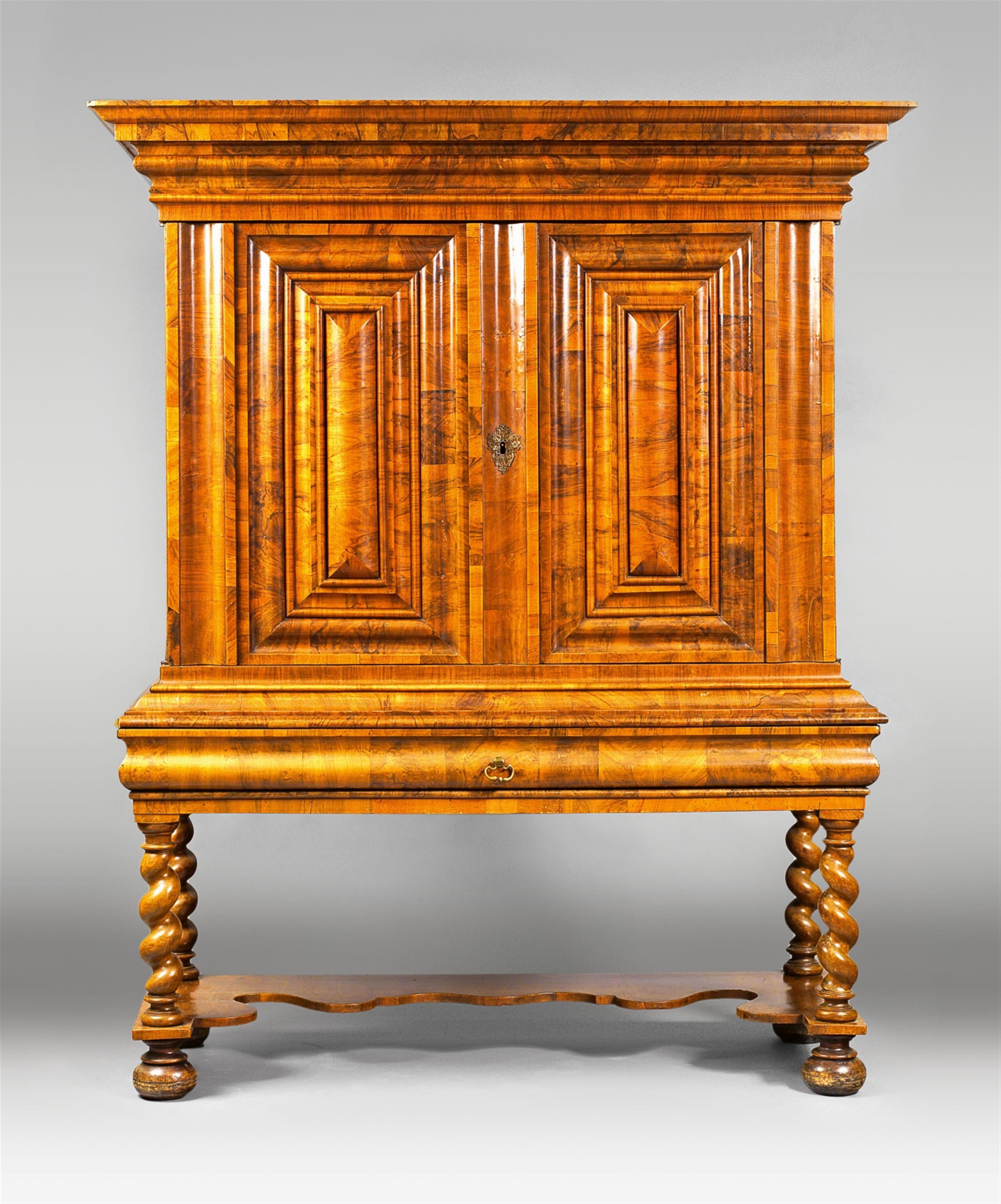 A Zurich walnut veneer cabinet on stand - image-1
