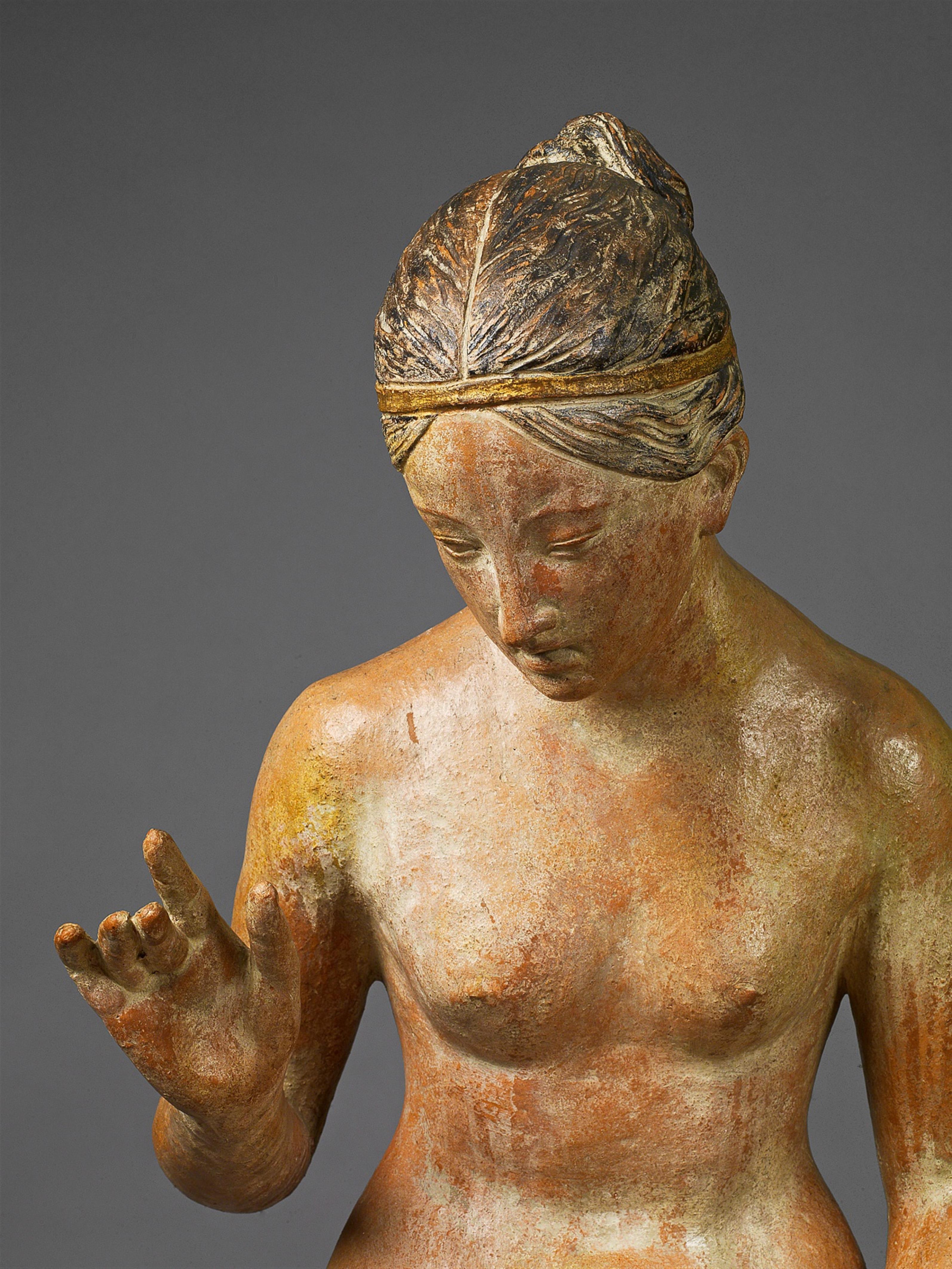 A terracotta figure of a bathing woman - image-2