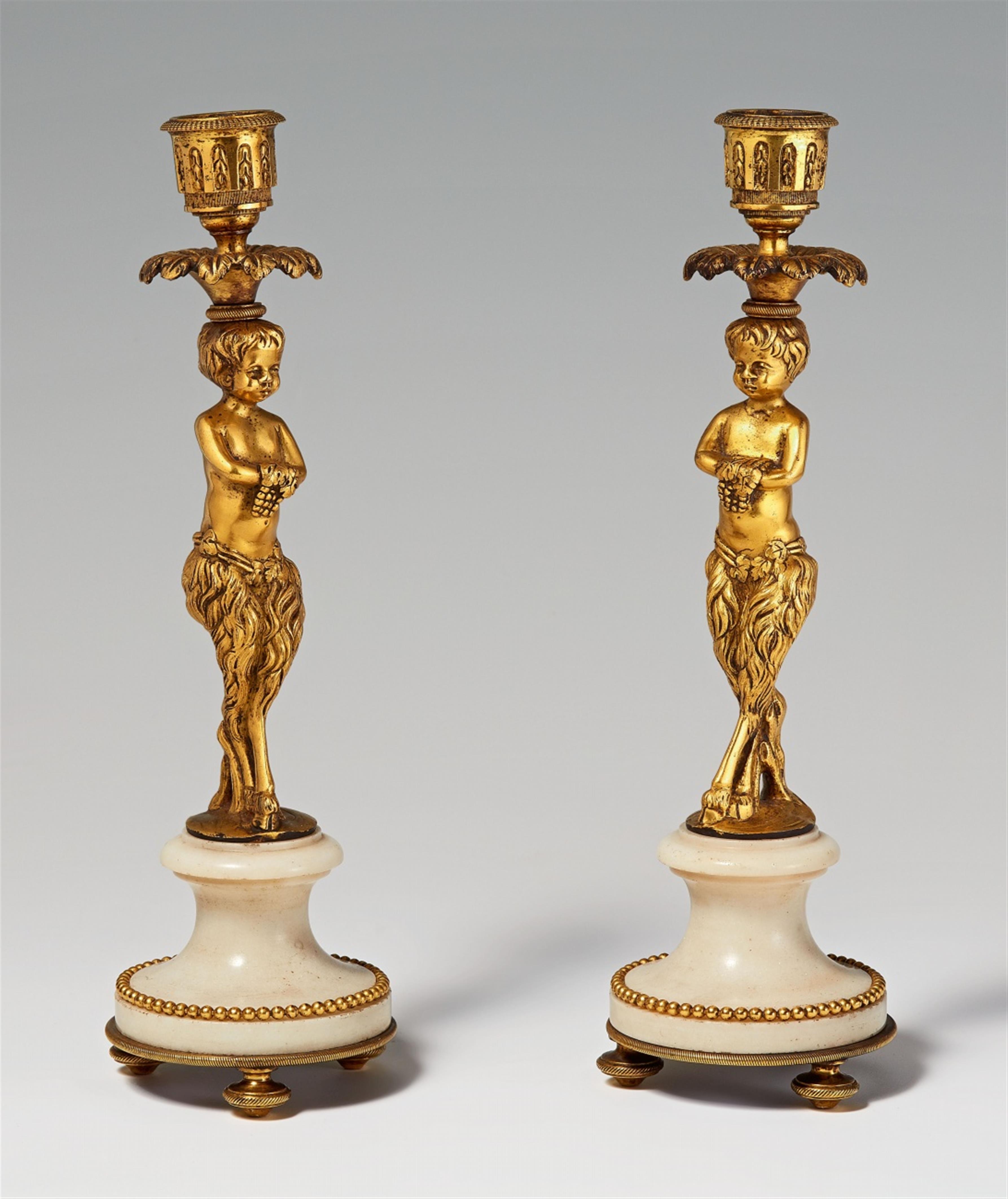 A pair of Louis XVI style ormolu-mounted marble candlesticks - image-1