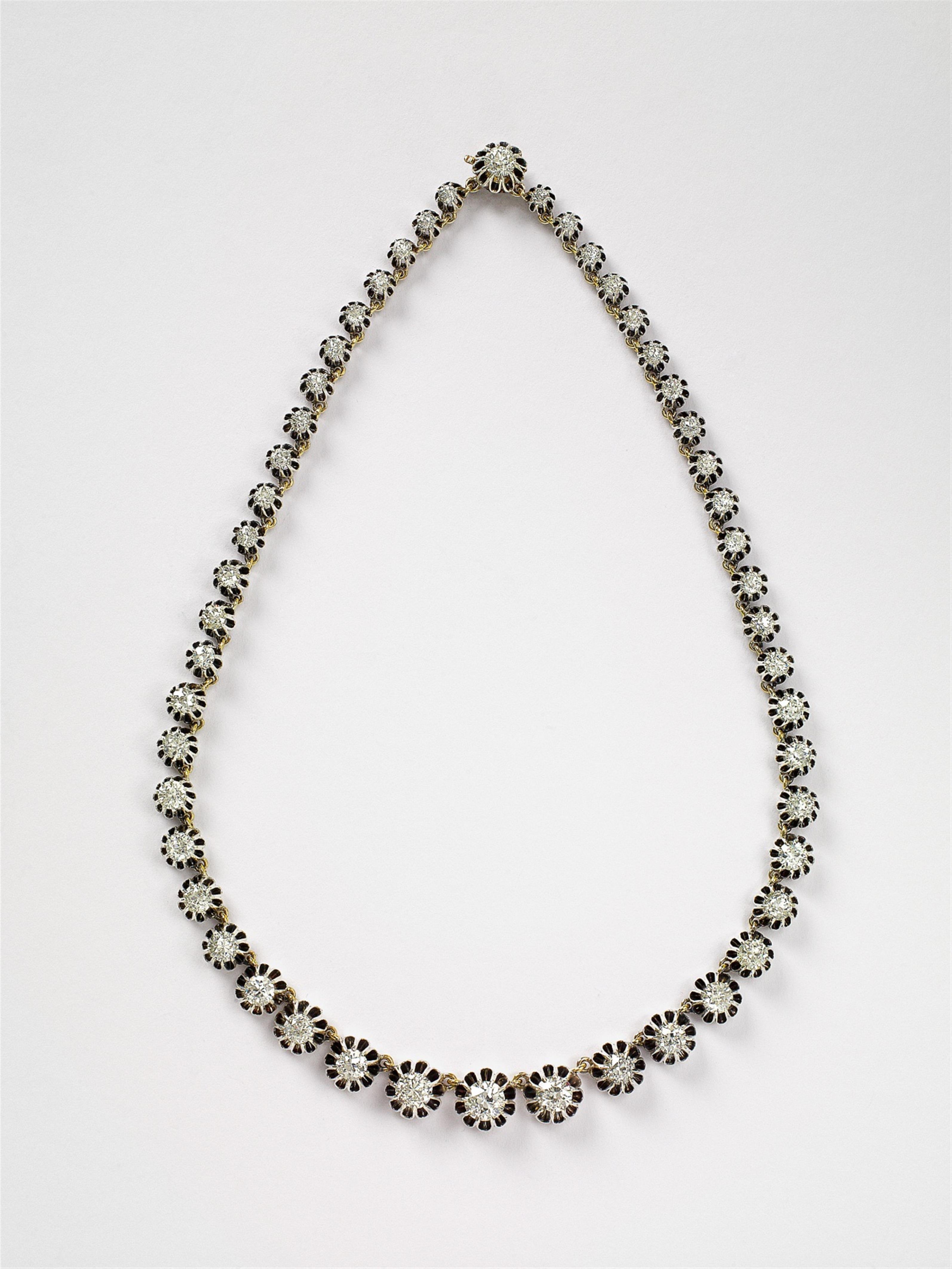 A 14k gold and diamond rivière collier - image-2