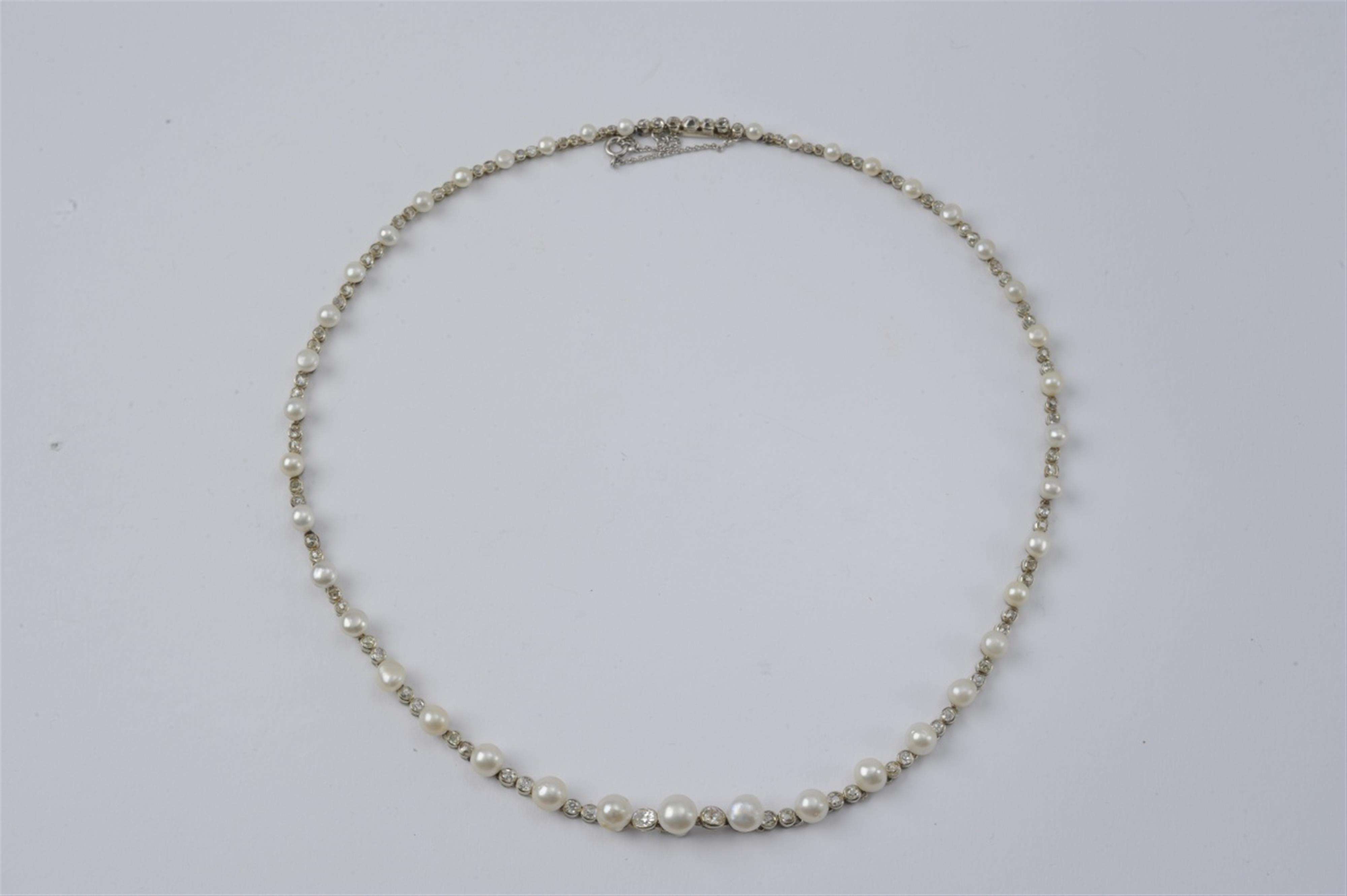 An 18k white gold, pearl, and diamond rivière necklace - image-1