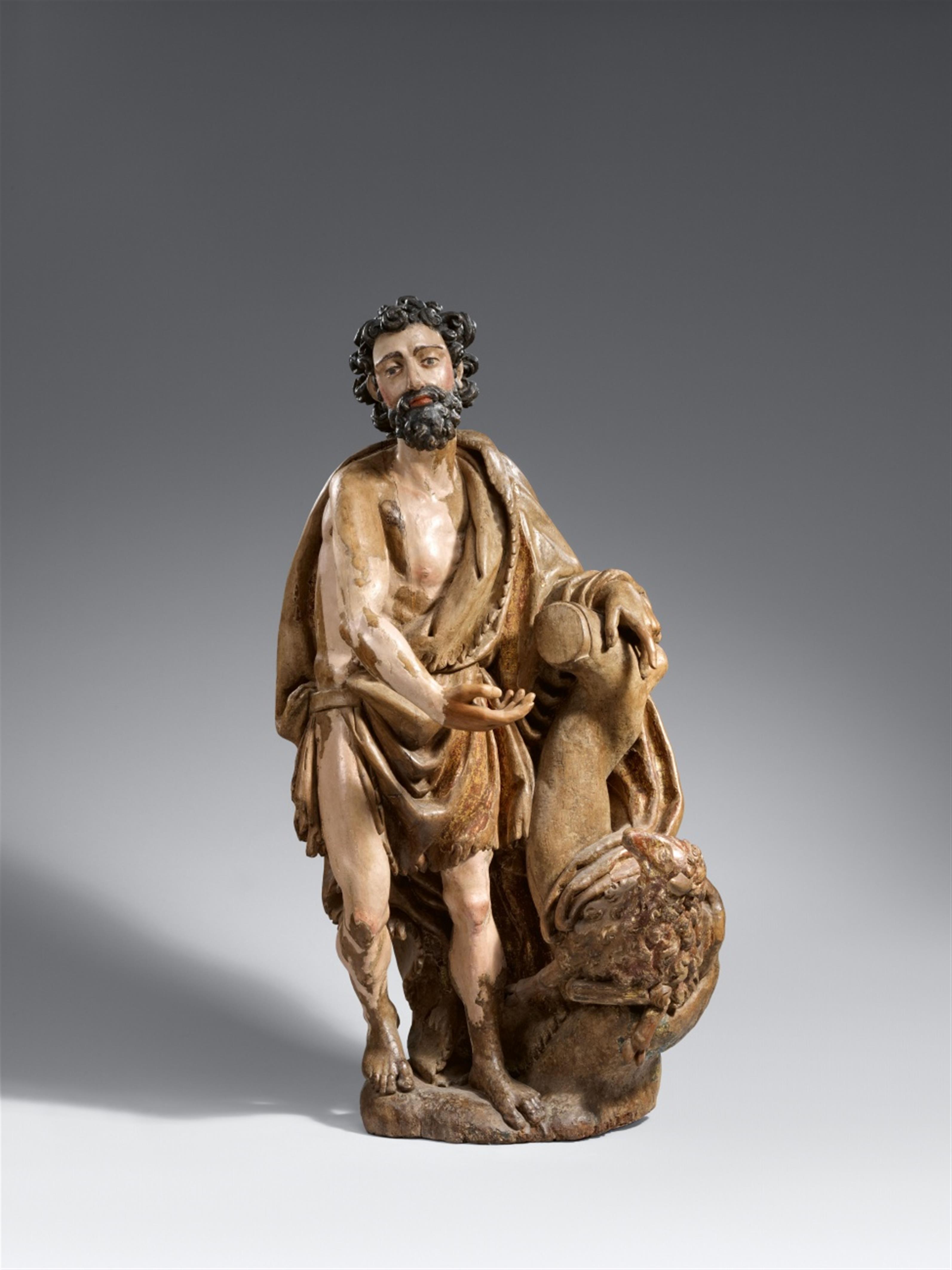 Spain, circa 1520/1530 - A Spanish carved walnut figure of John the Baptist, circa 1520/1530 - image-1