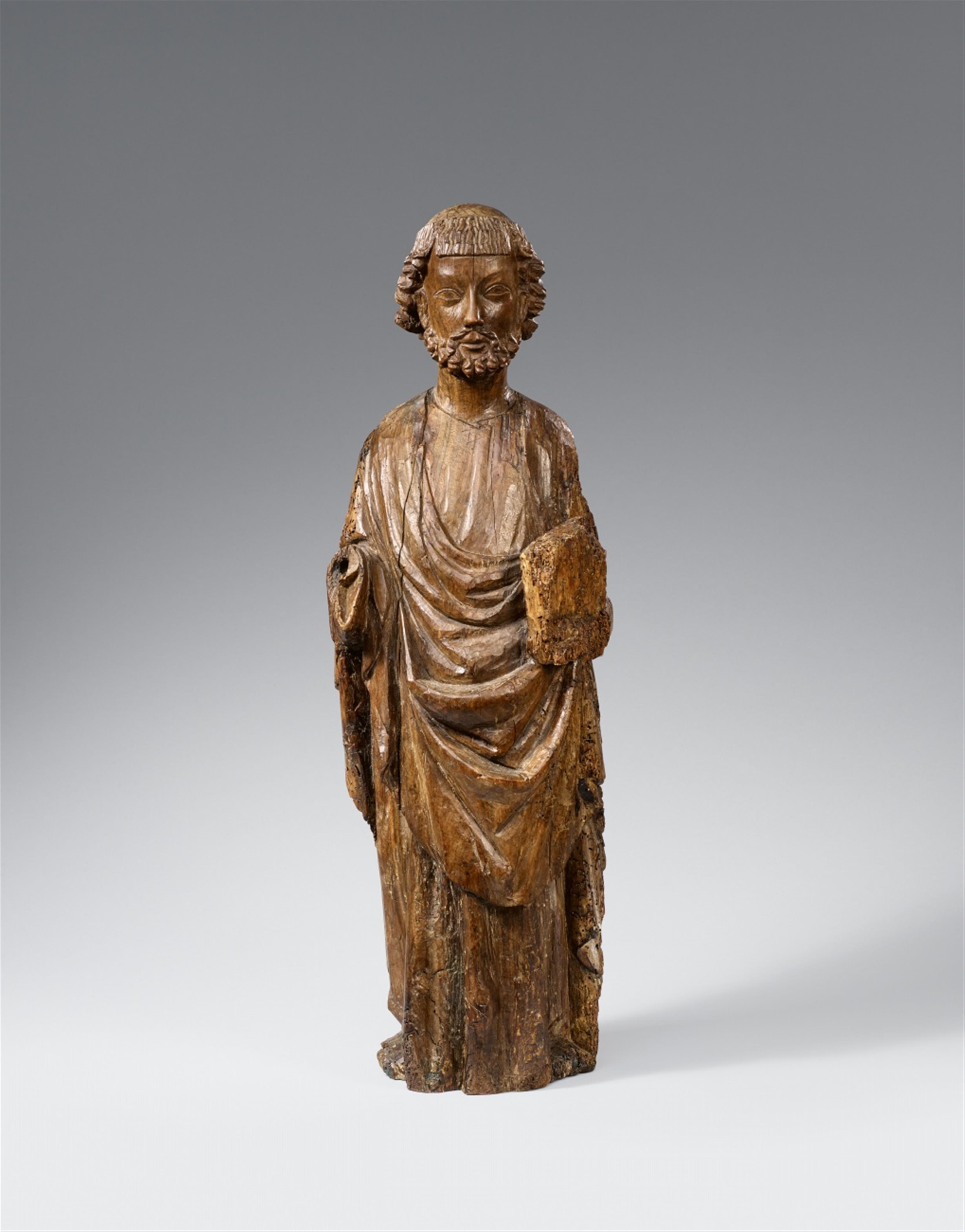 Probably Lothringen, mid-14th century - A carved walnut figure of an Apostle, probably Lorraine, mid-14th century - image-1