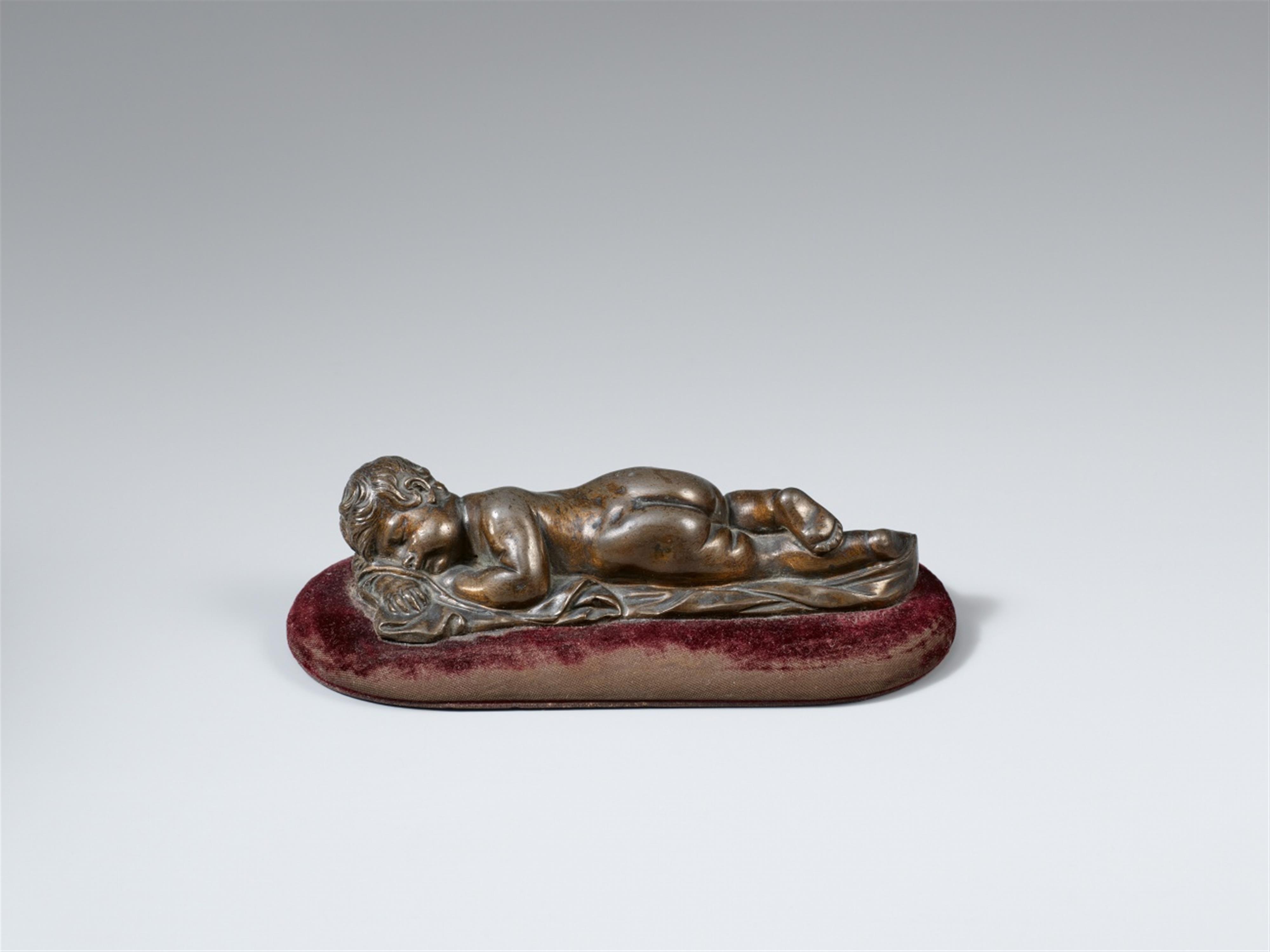 François Duquesnoy, circle of - A bronze figure of a sleeping Putto facing left from the circle of François Duquesnoy - image-1