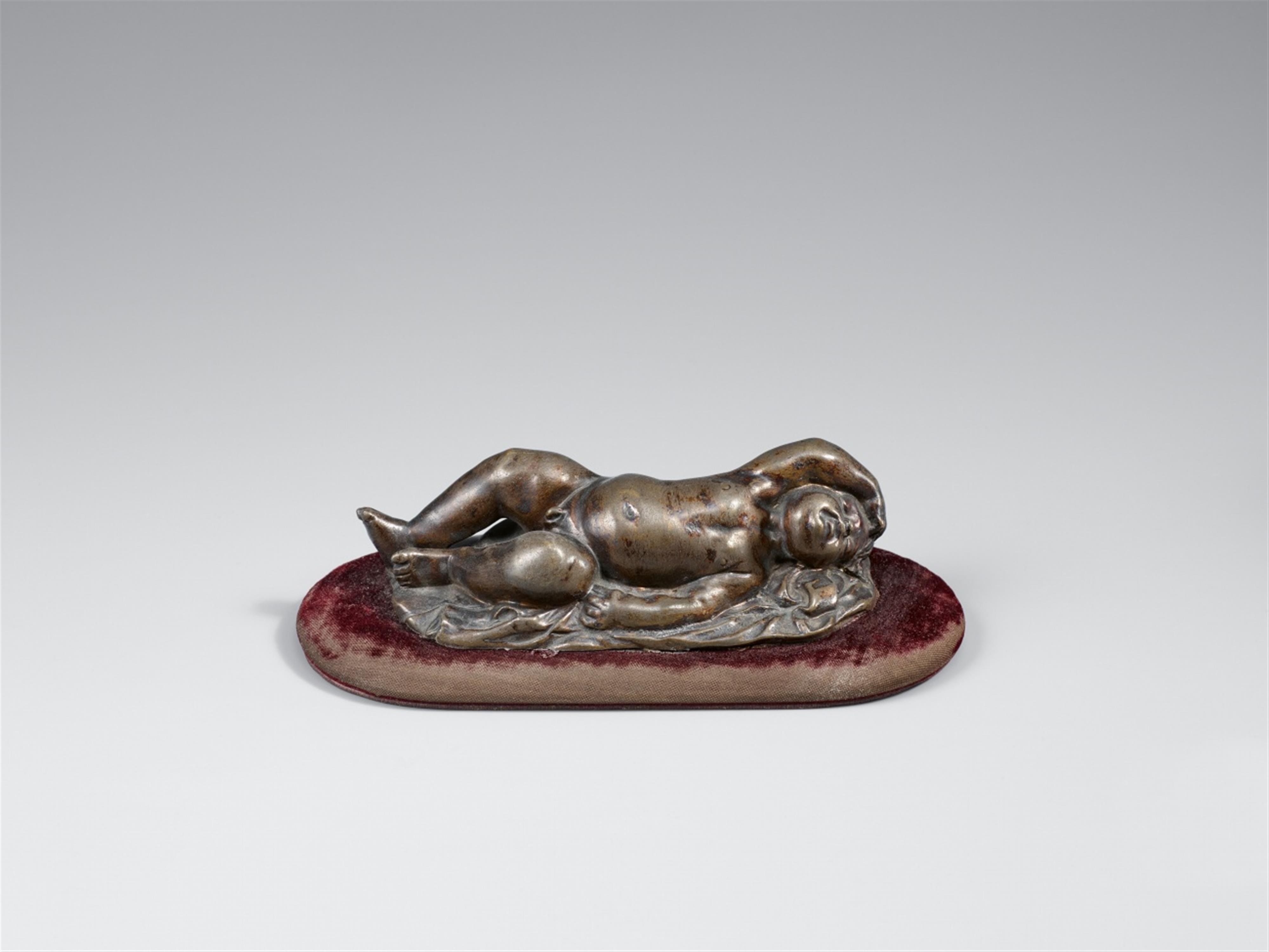 François Duquesnoy, circle of - A bronze figure of a sleeping Putto facing left from the circle of François Duquesnoy - image-1