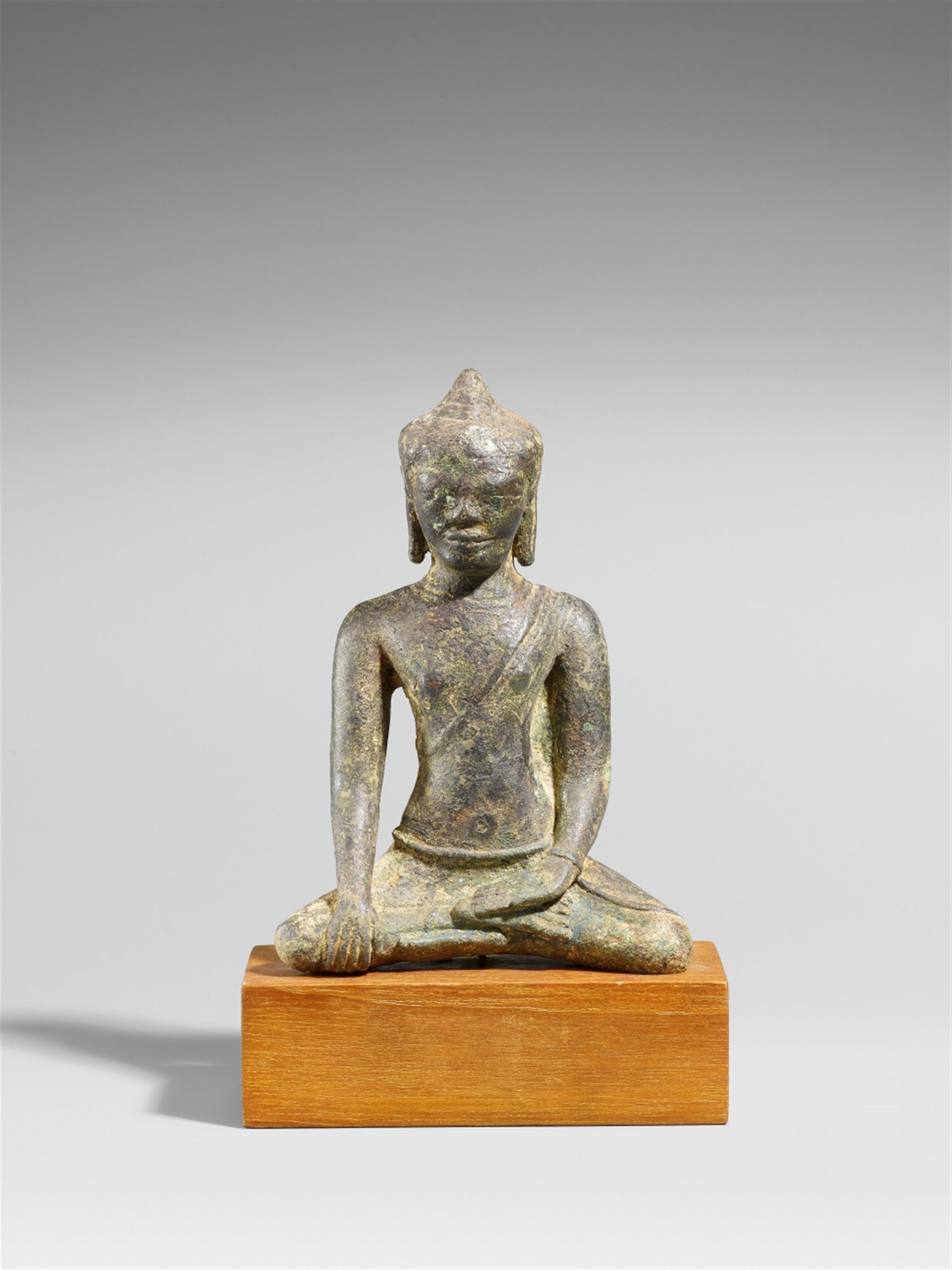 A Dvaravati bronze figure of Buddha Shakyamuni. Ca 11th century - image-1