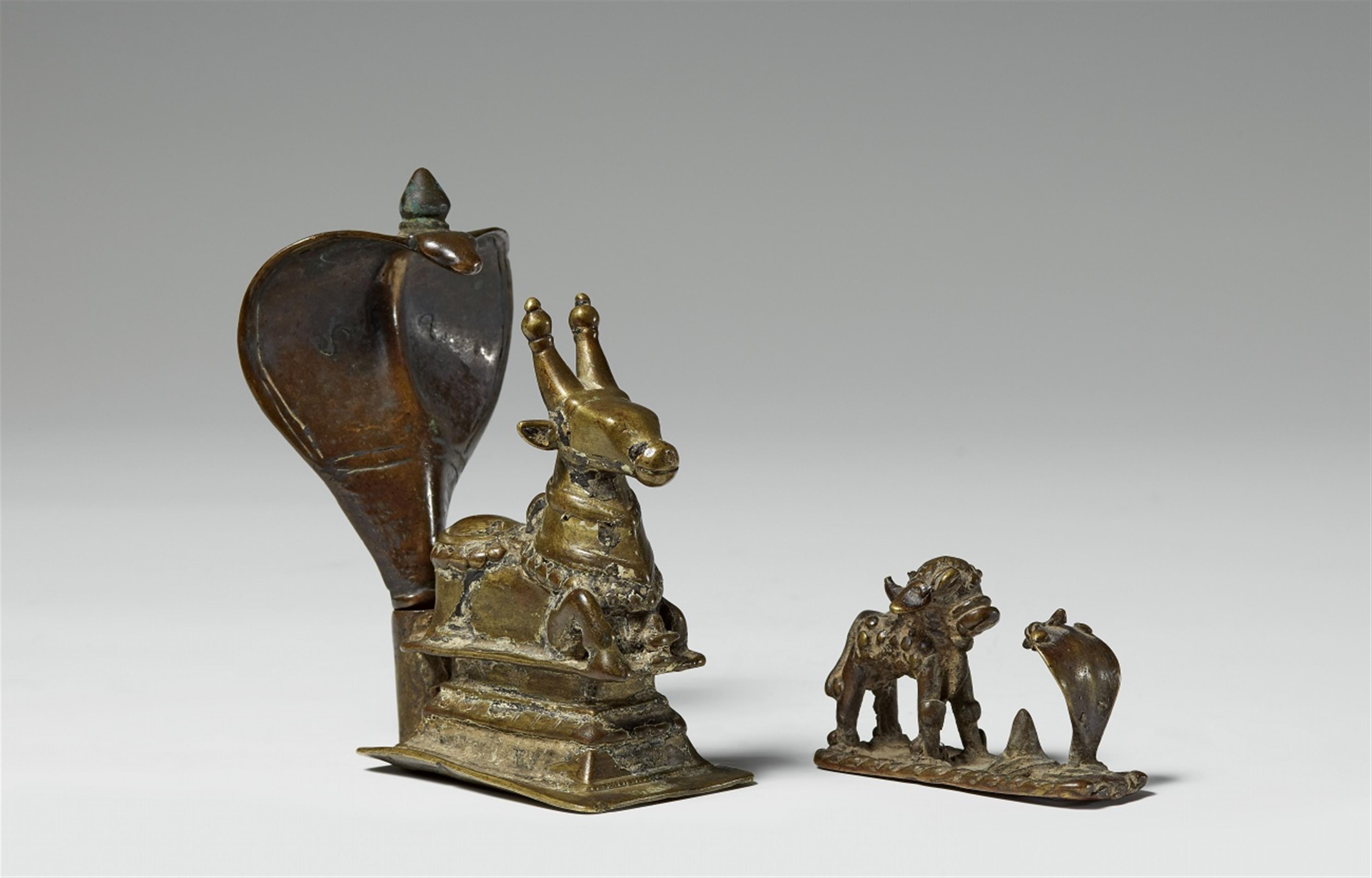 Two Maharashtra/Andhra Pradesh copper alloy/brass figures of Nandi. 19th/20th century - image-1