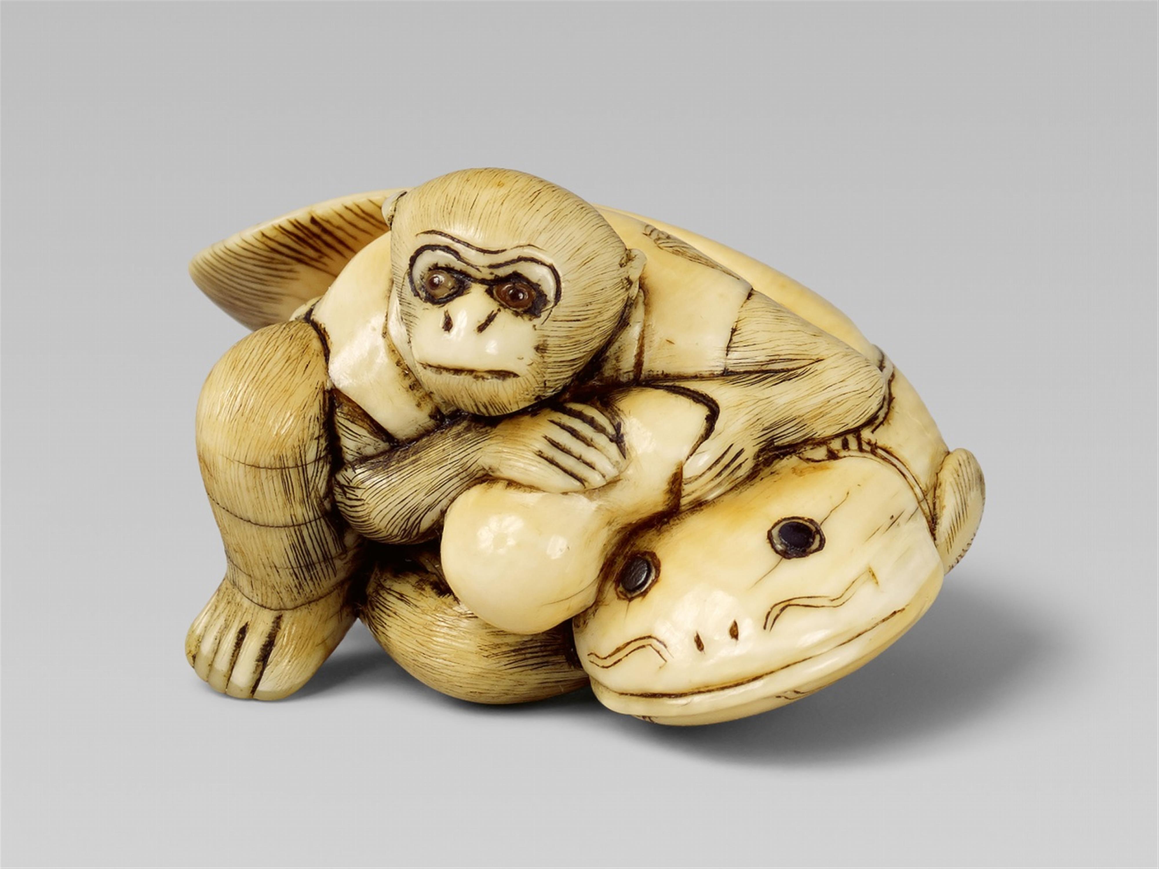 An ivory netsuke of a monkey and a catfish, by Hidemasa. Early 19th century - image-1