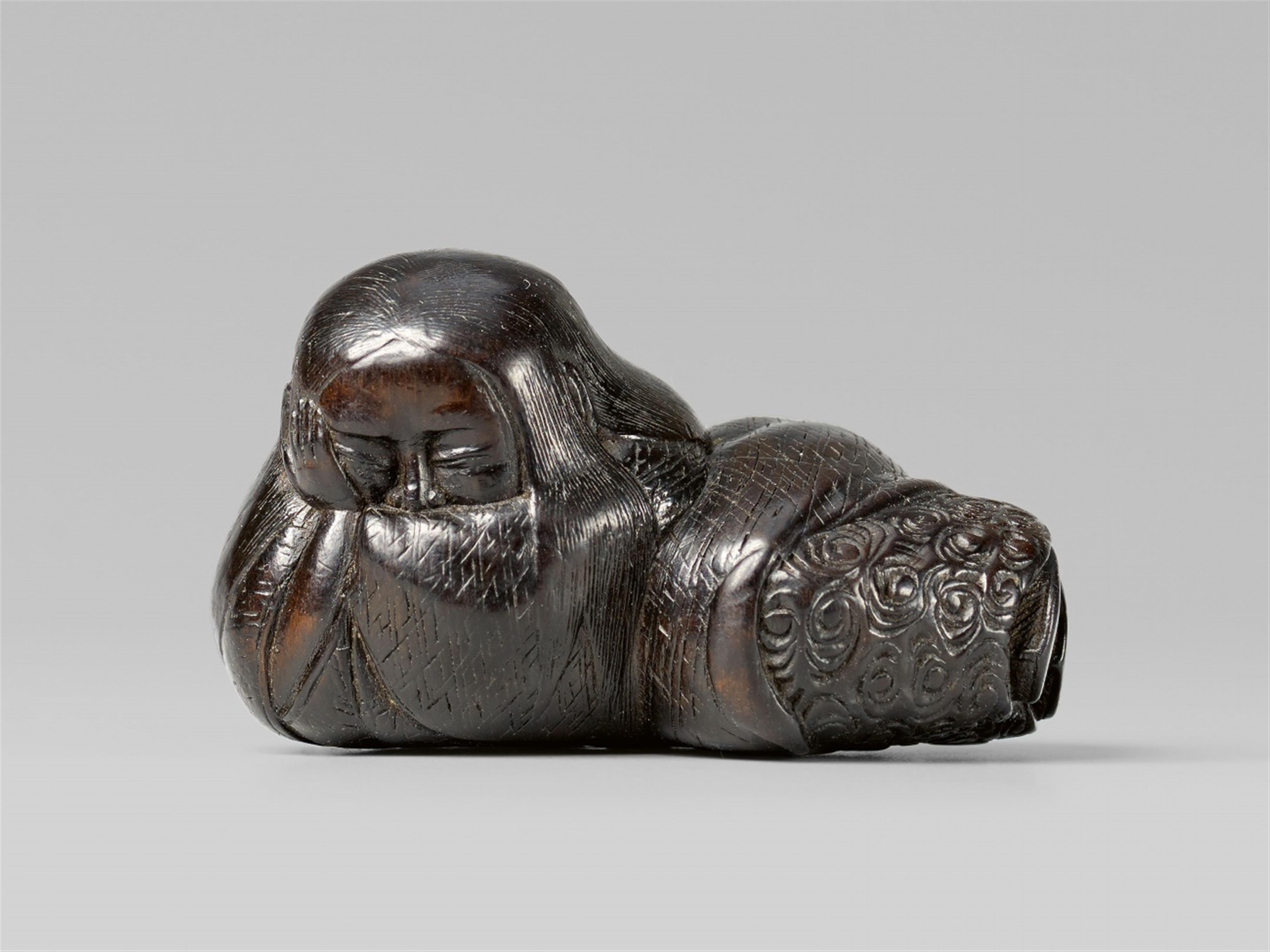 A large Nagoya school black wood netsuke of a sleeping shôjô, by Motohiro. Mid-19th century - image-1