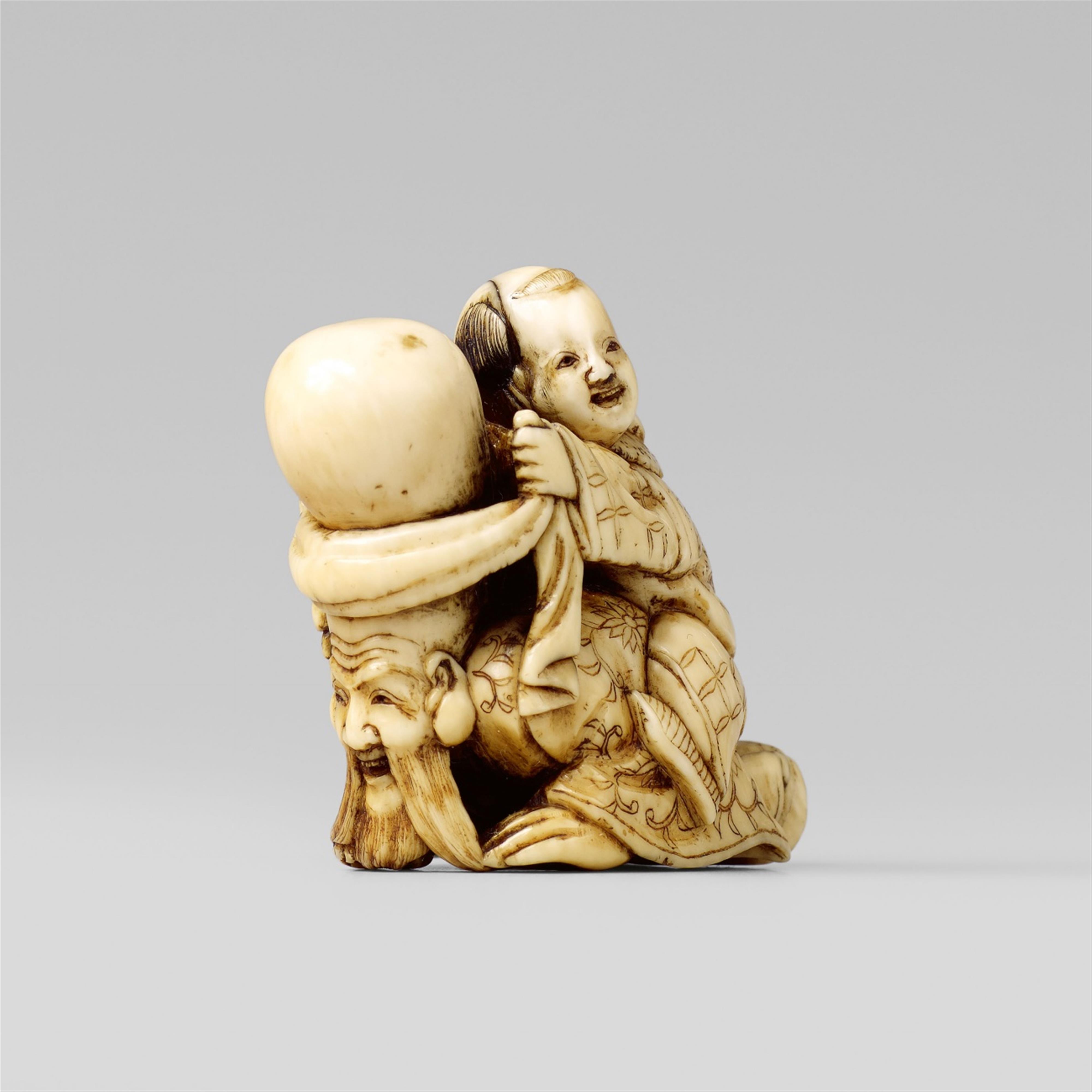 An Edo school ivory netsuke of a karako playing horse riding with Fukurokuju. Second 19th century - image-1