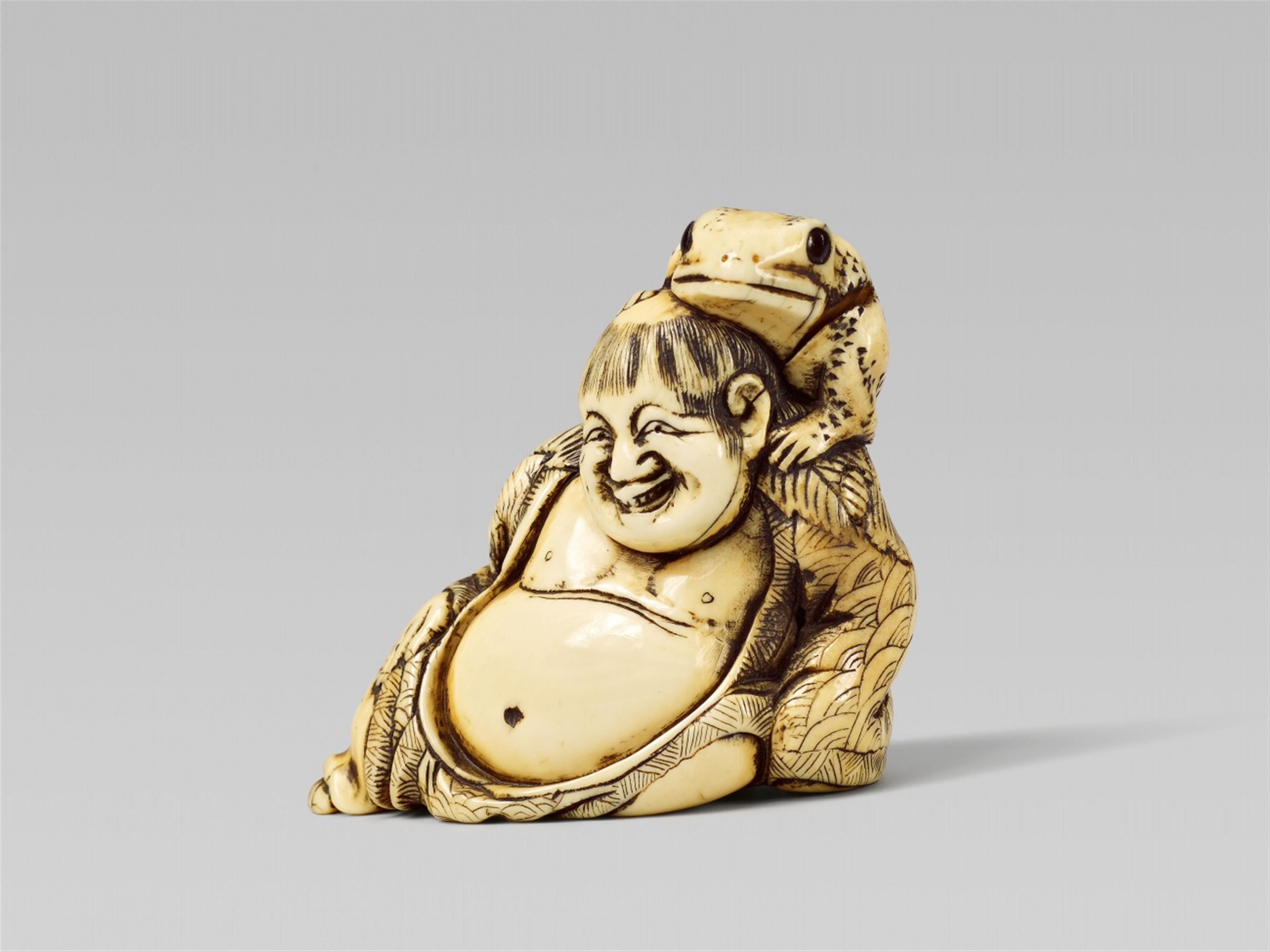 A fine ivory netsuke of a smiling Gama Sennin, by Yoshitomo. Late 18th/early 19th century - image-1