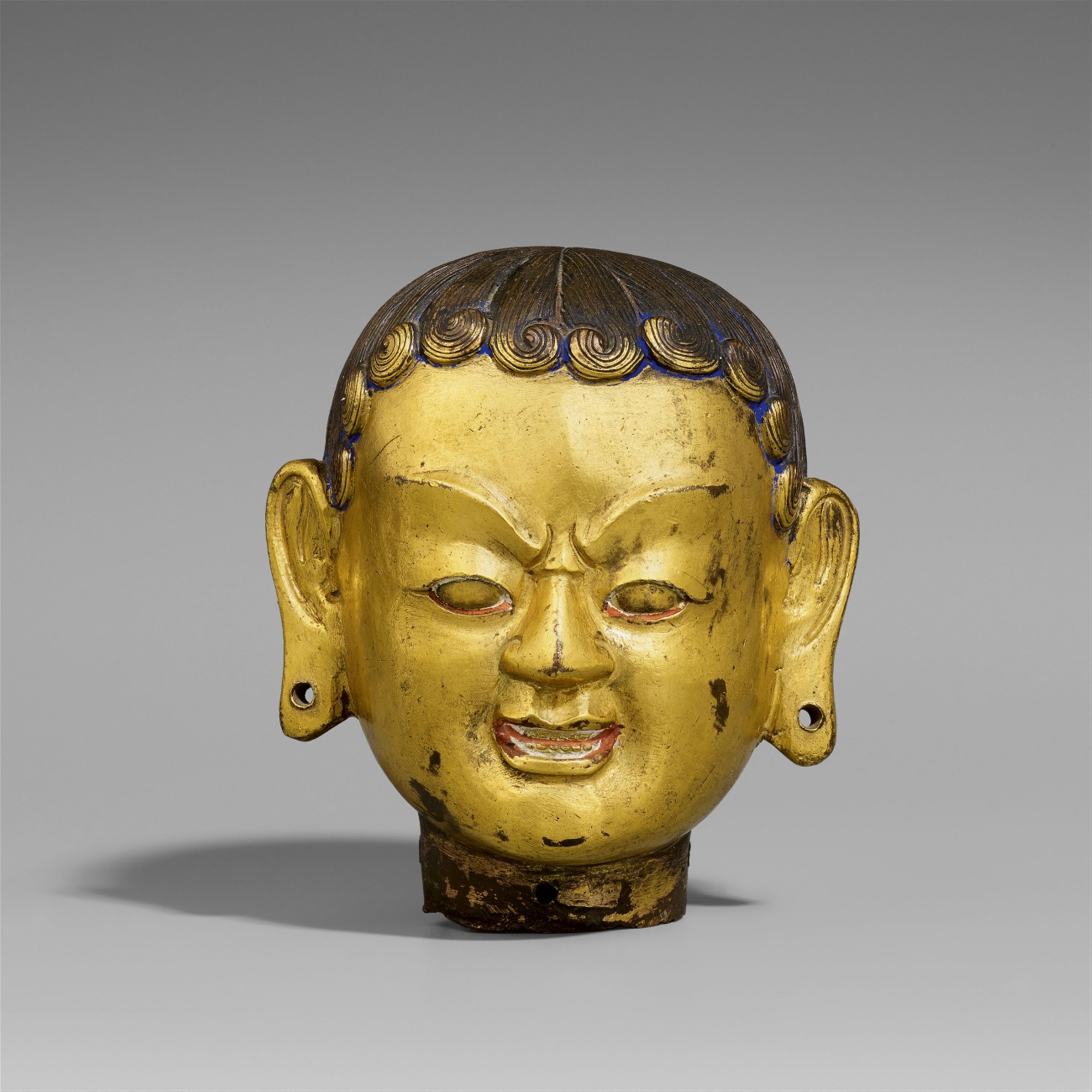 A Tibetan gilt bronze head. 18th Century - image-1