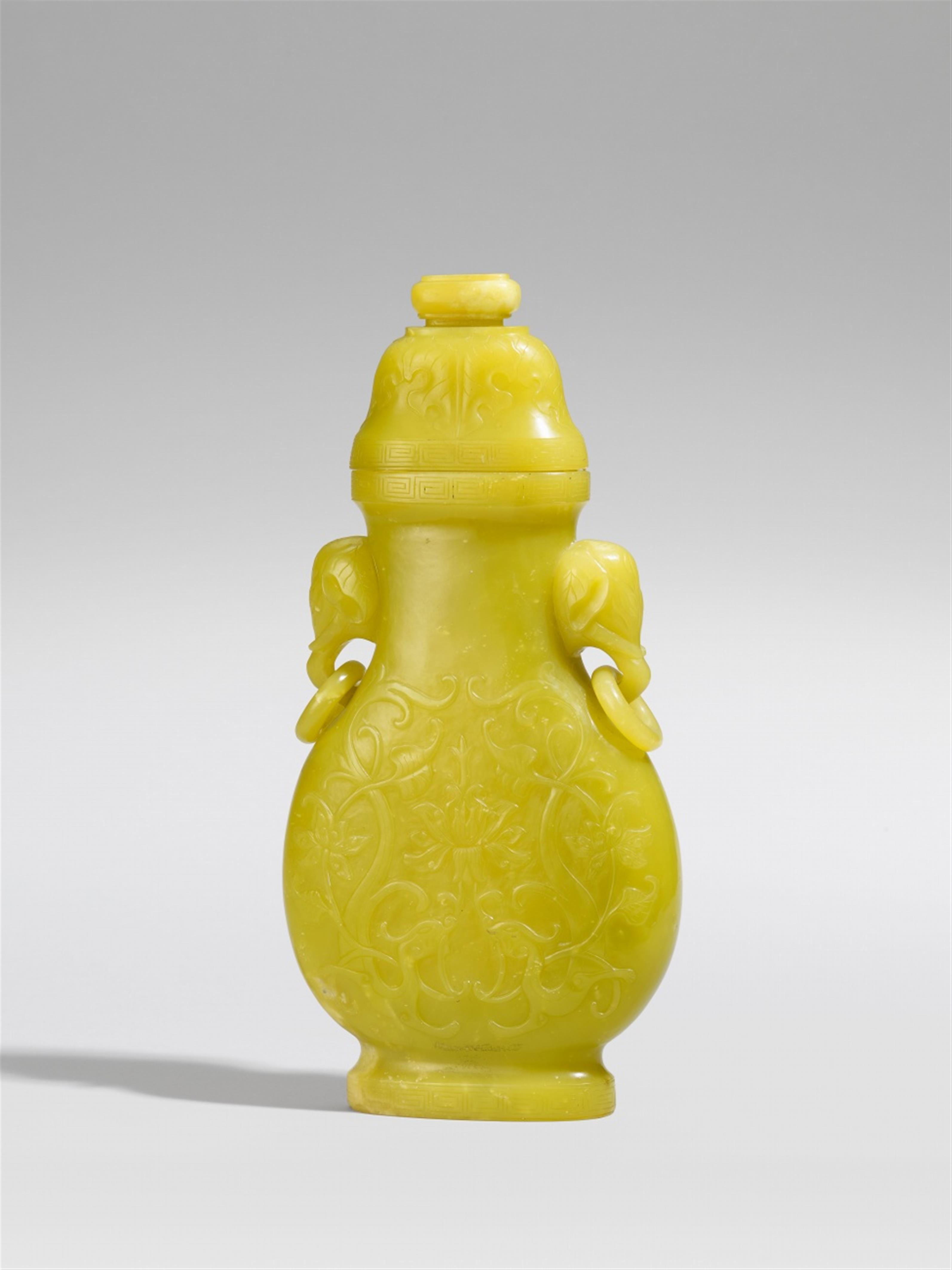 A large lidded vase of yellow-green serpentine. 19th century - image-1