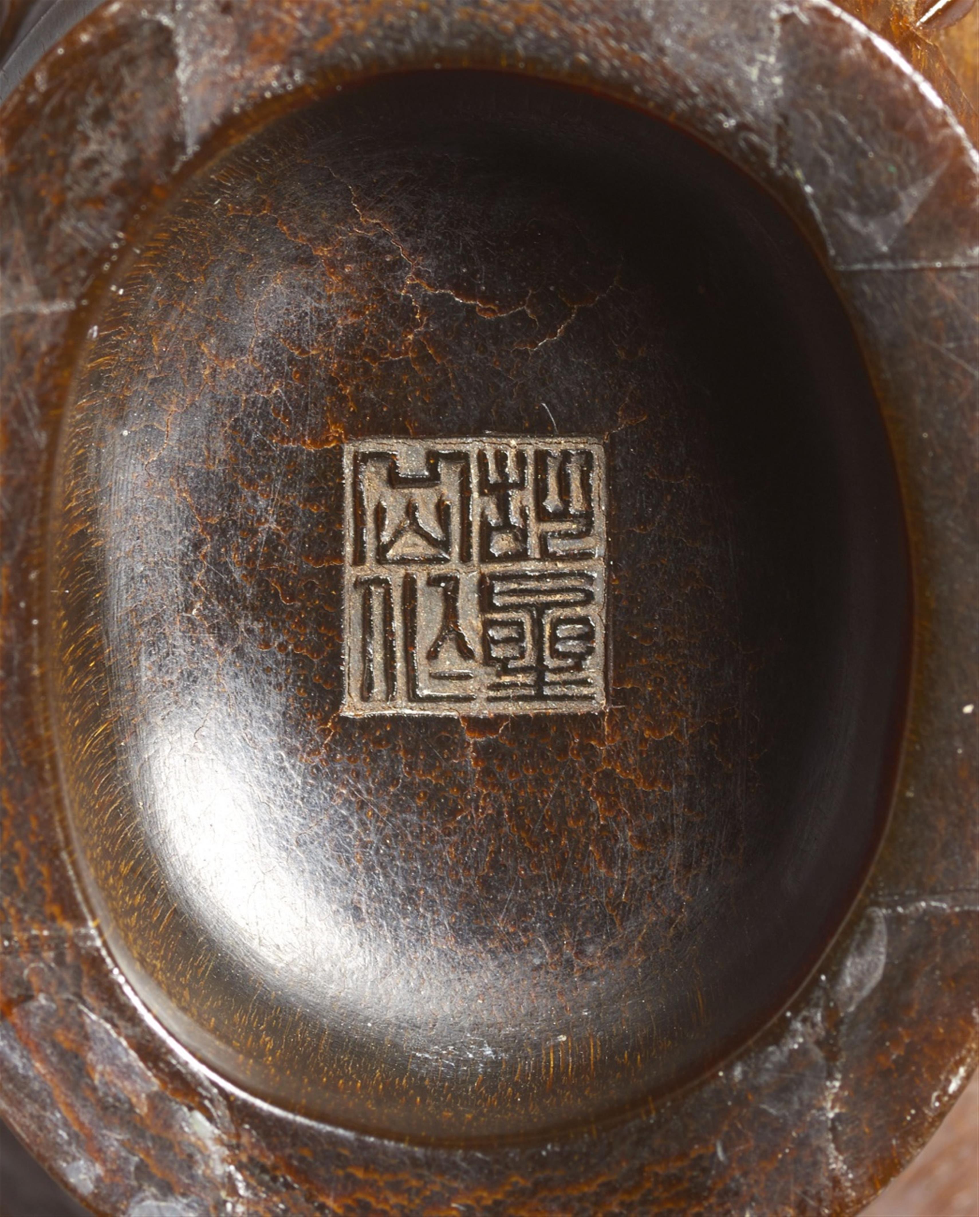 A fine archaistic rhinoceros libation cup. Qing dynasty - image-2
