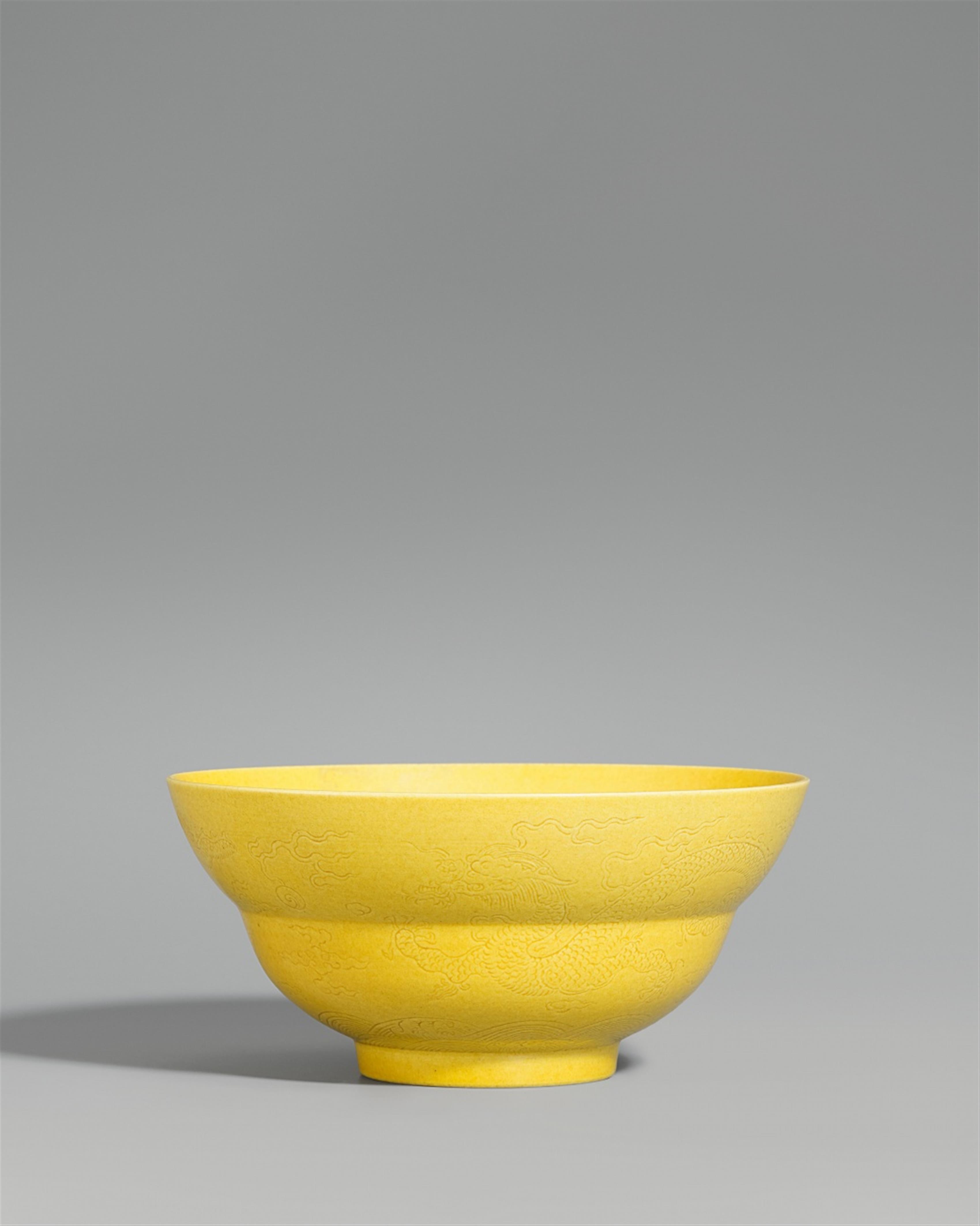 A yellow-glazed incised dragon bowl - image-1