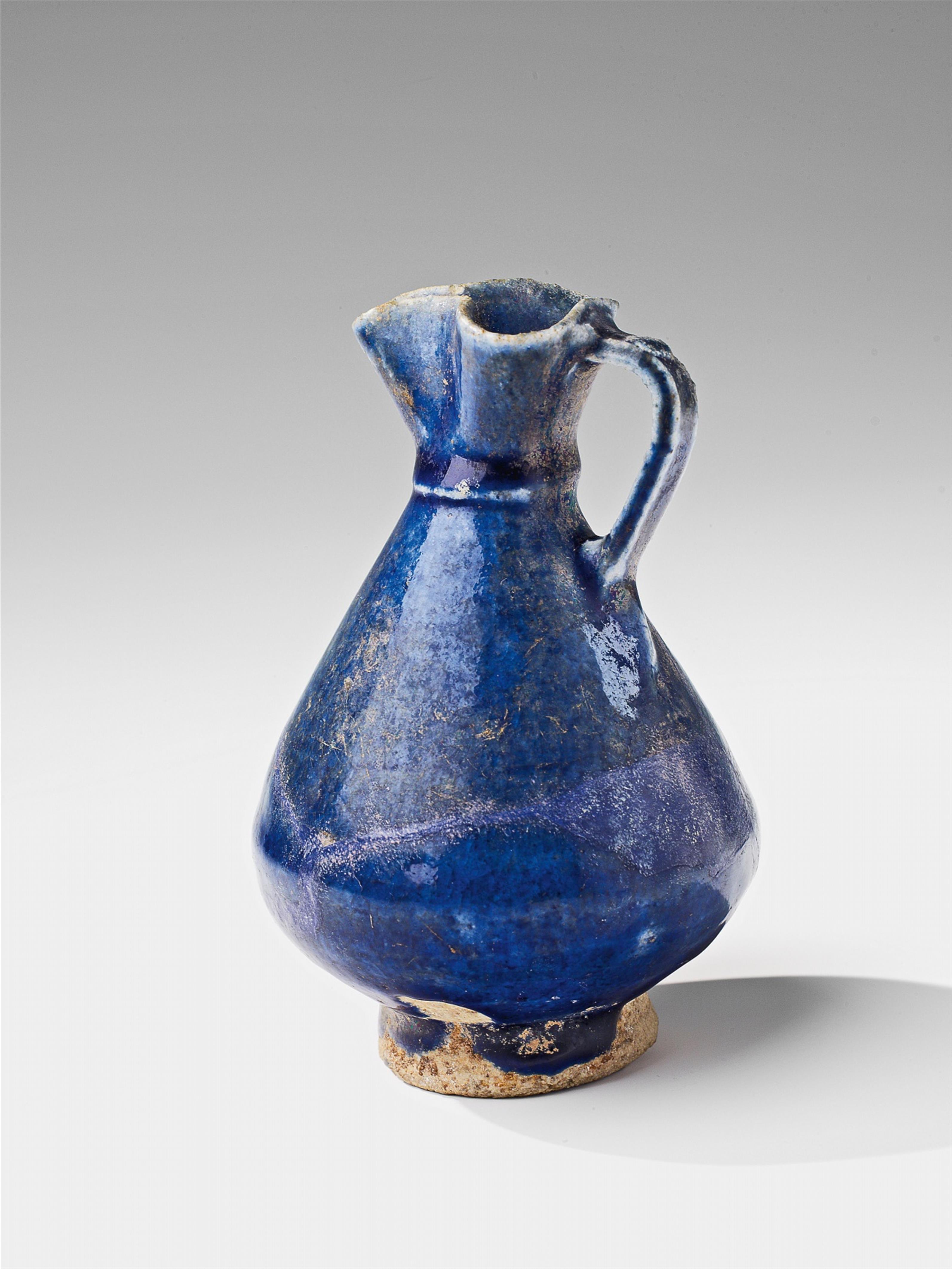 A small Iranian fritware ewer - image-1