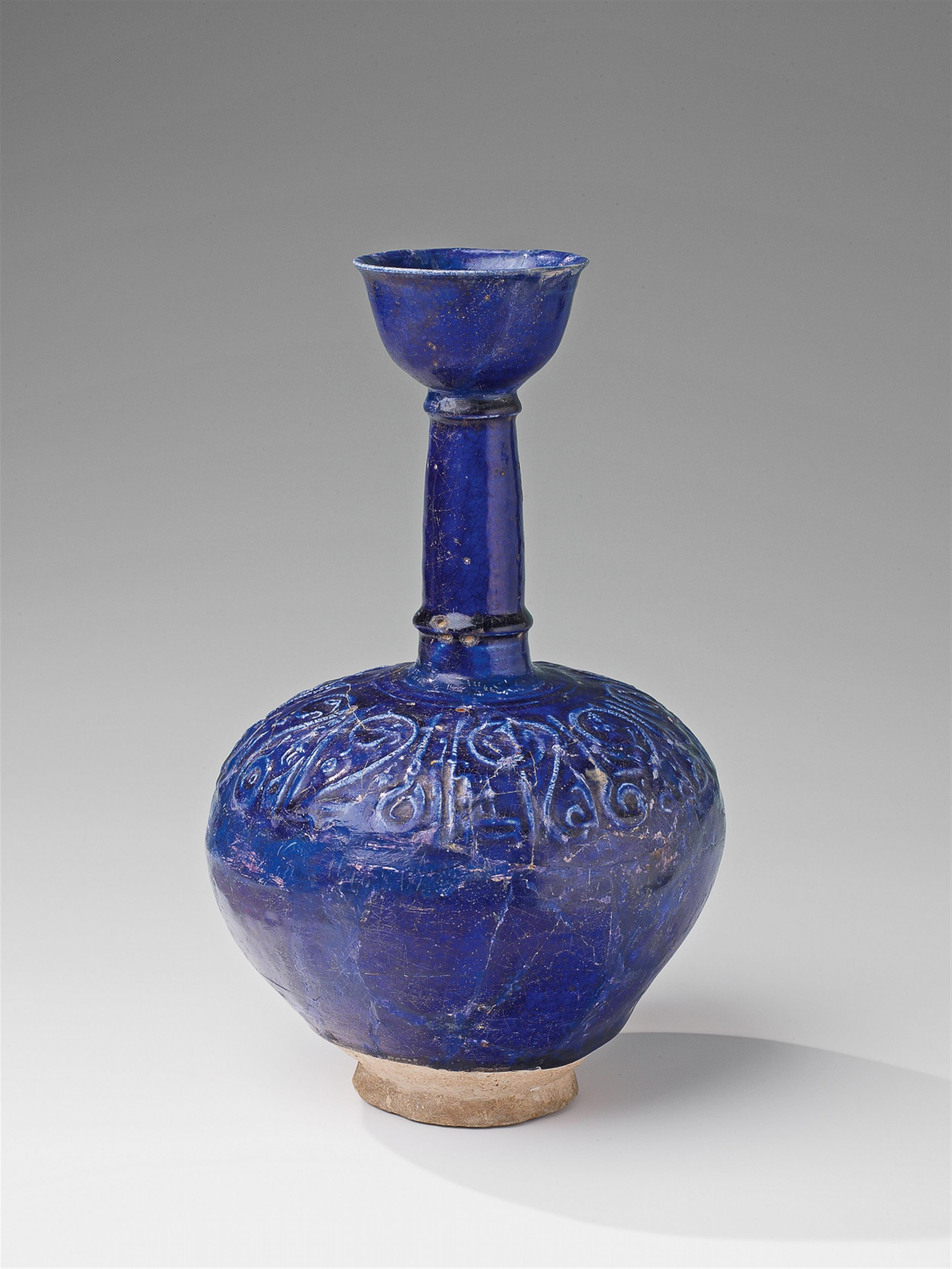 A narrow-necked Iranian fritware flask - image-1