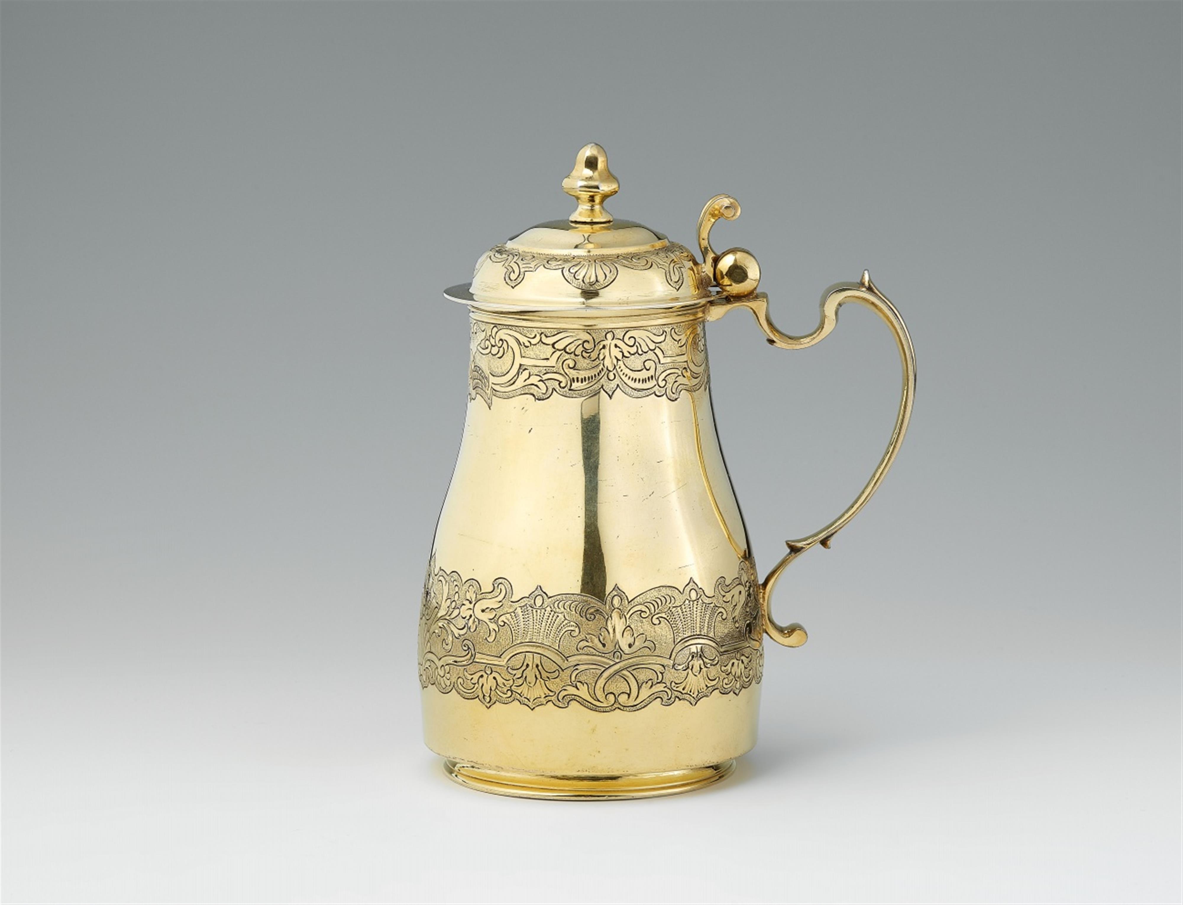 An Augsburg silver gilt tankard and cover - image-1