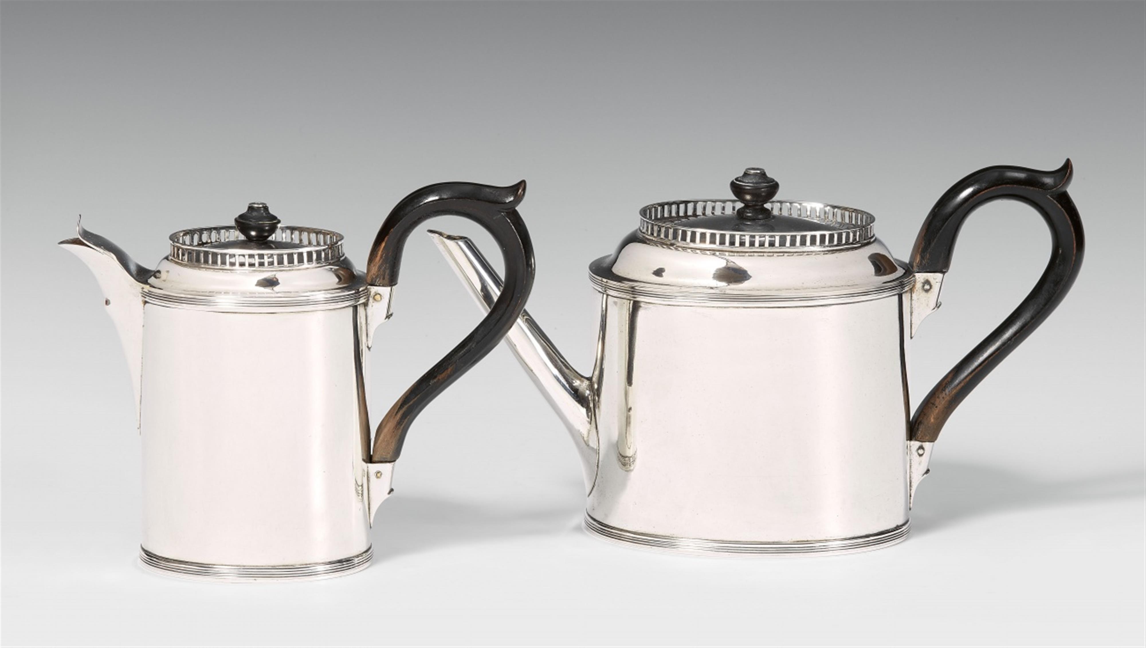 A Kassel silver teapot and hot milk jug - image-1