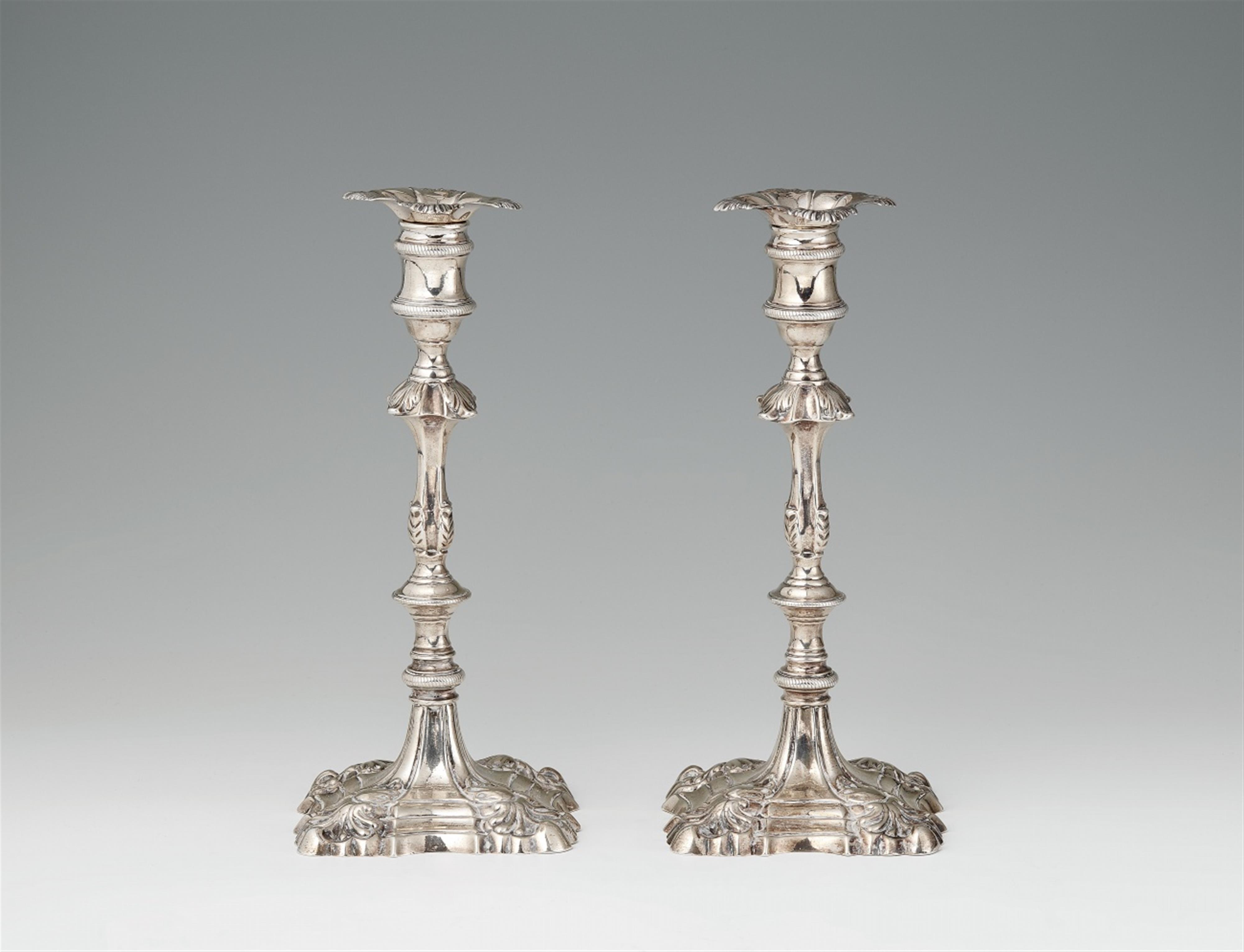 A pair of George II silver candlesticks - image-1