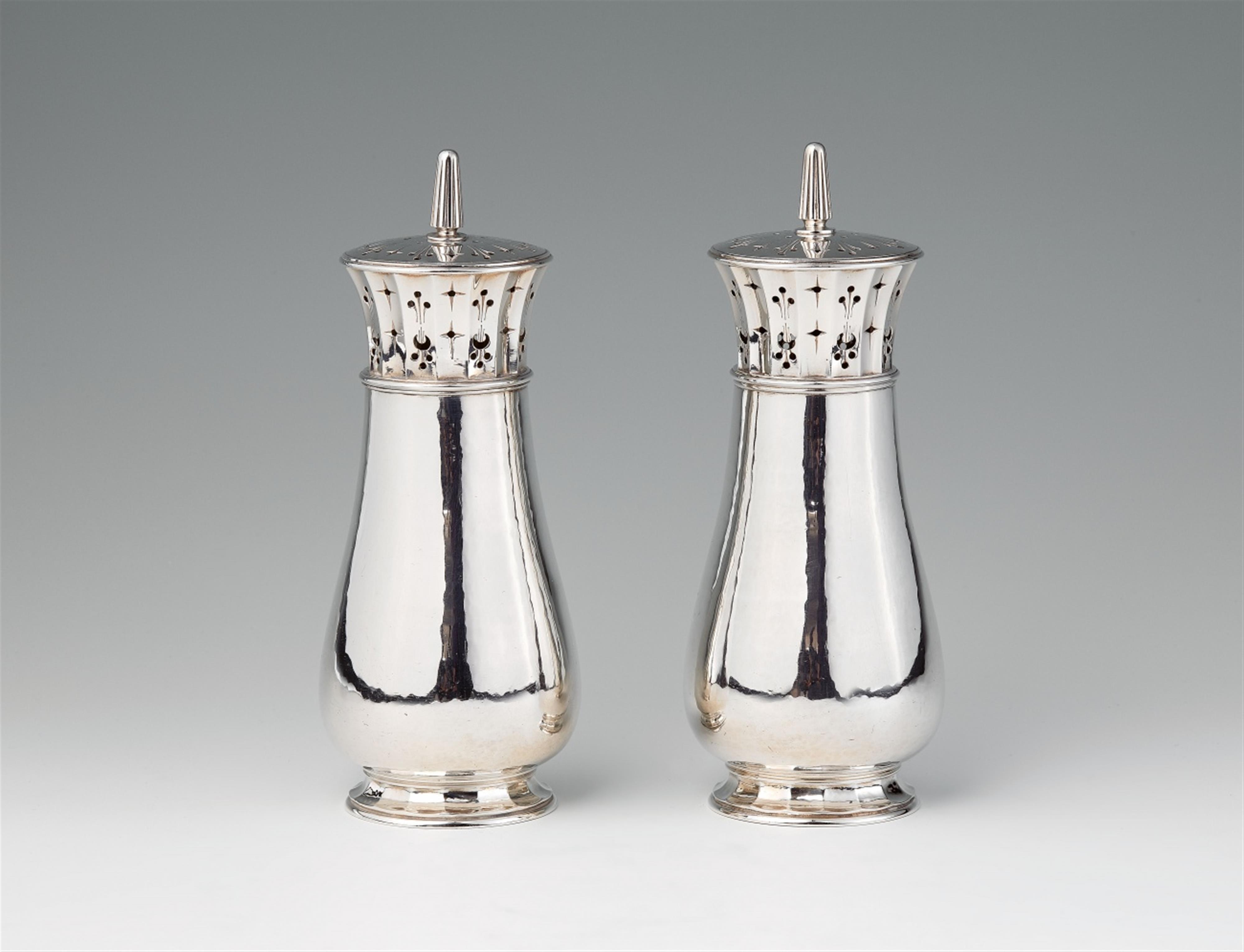 A pair of London silver sugar casters - image-1