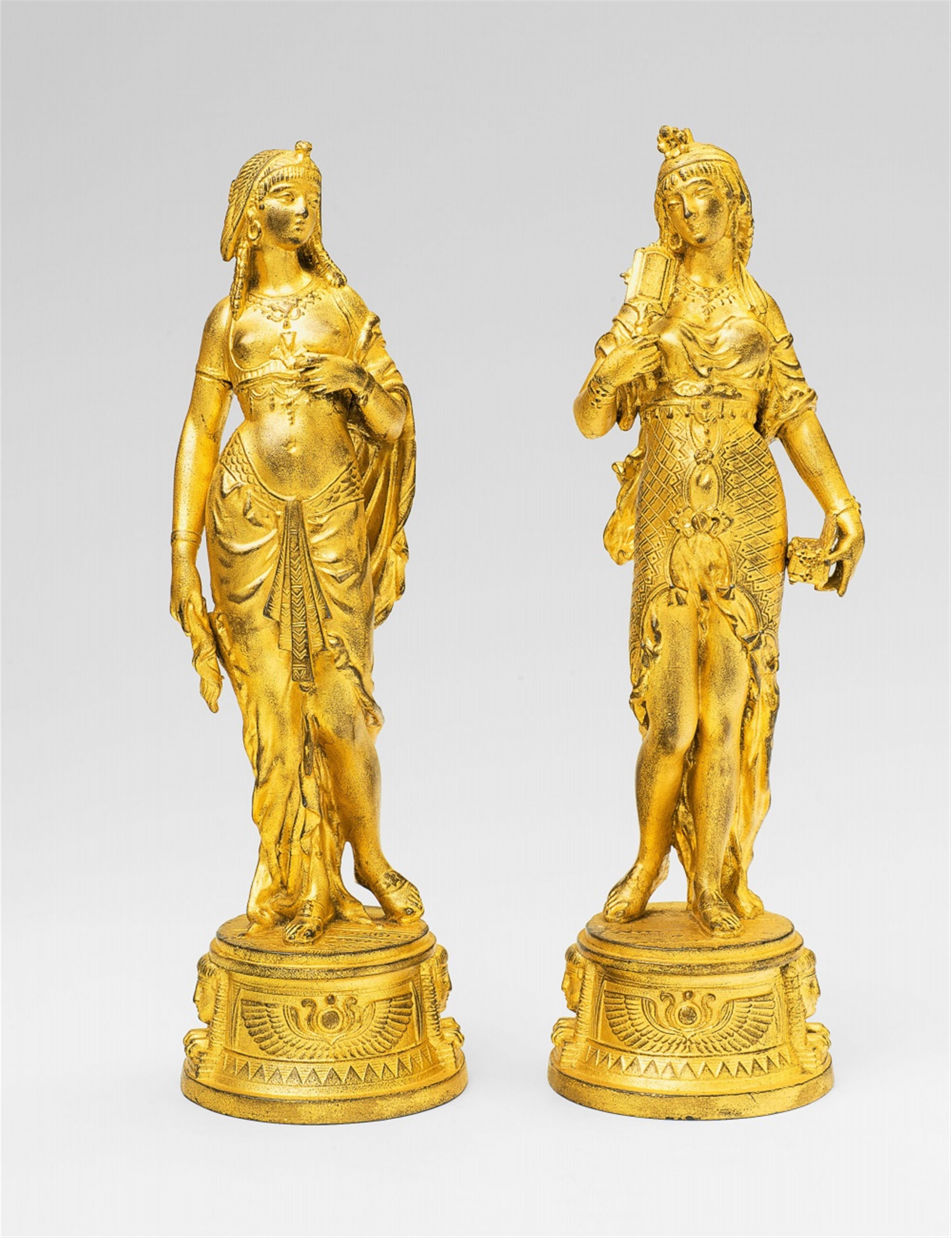 Two cast and gilt lead statues of Egyptian ladies - image-1