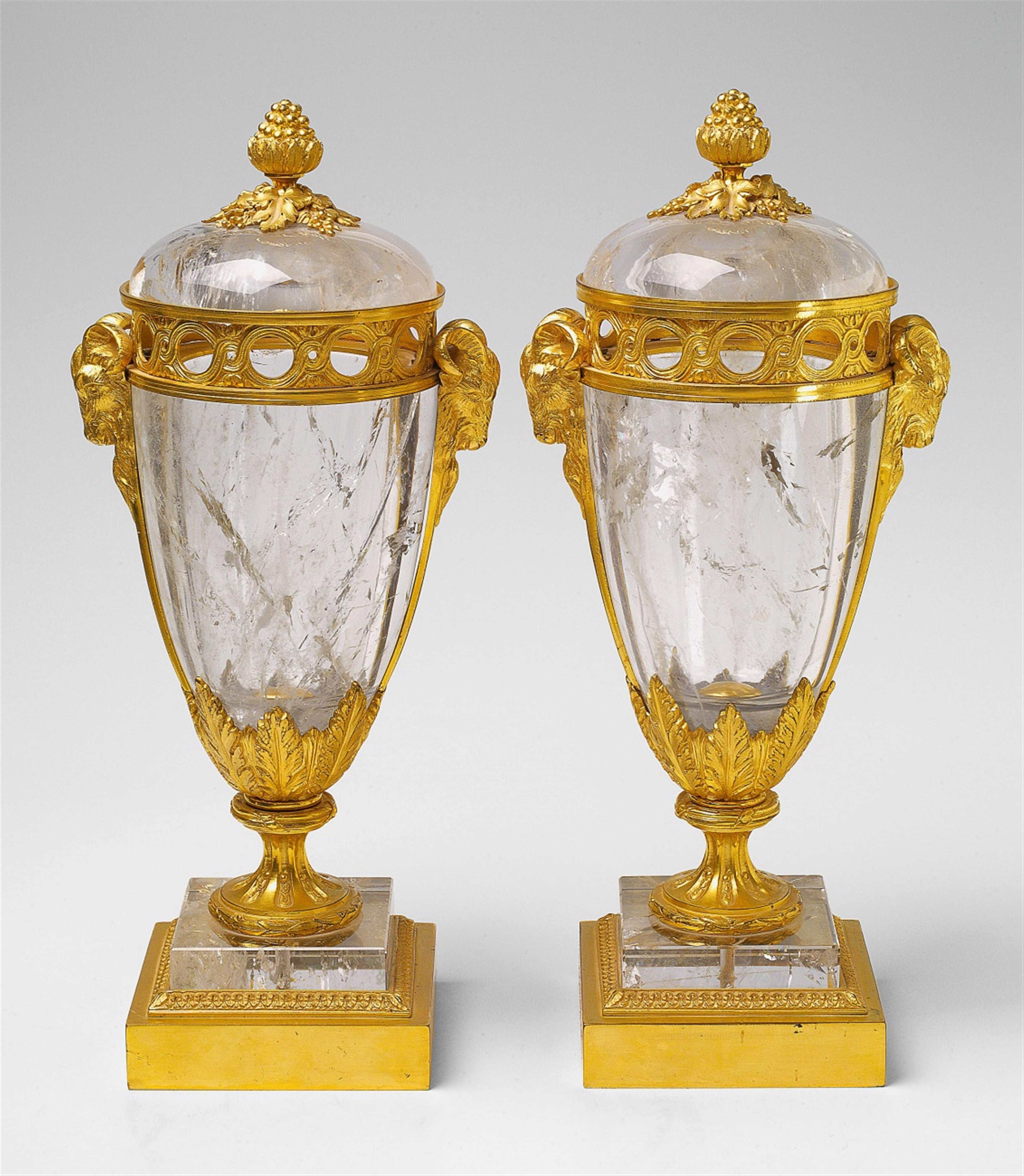 A rare pair of rock crystal potpourri vases in the manner of Pierre Gouthière - image-1