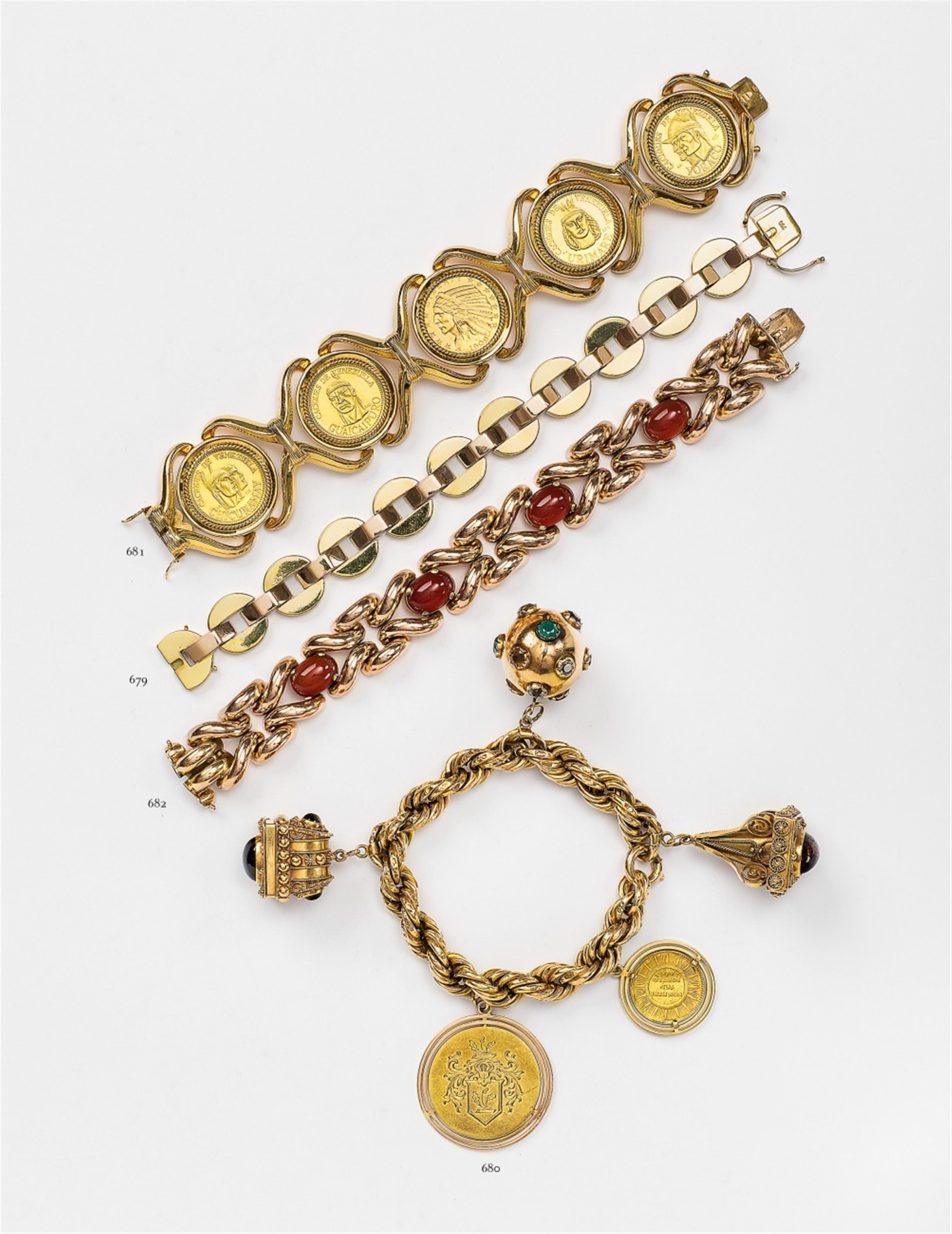 A gold charm bracelet with a Cologne gold coin - image-2
