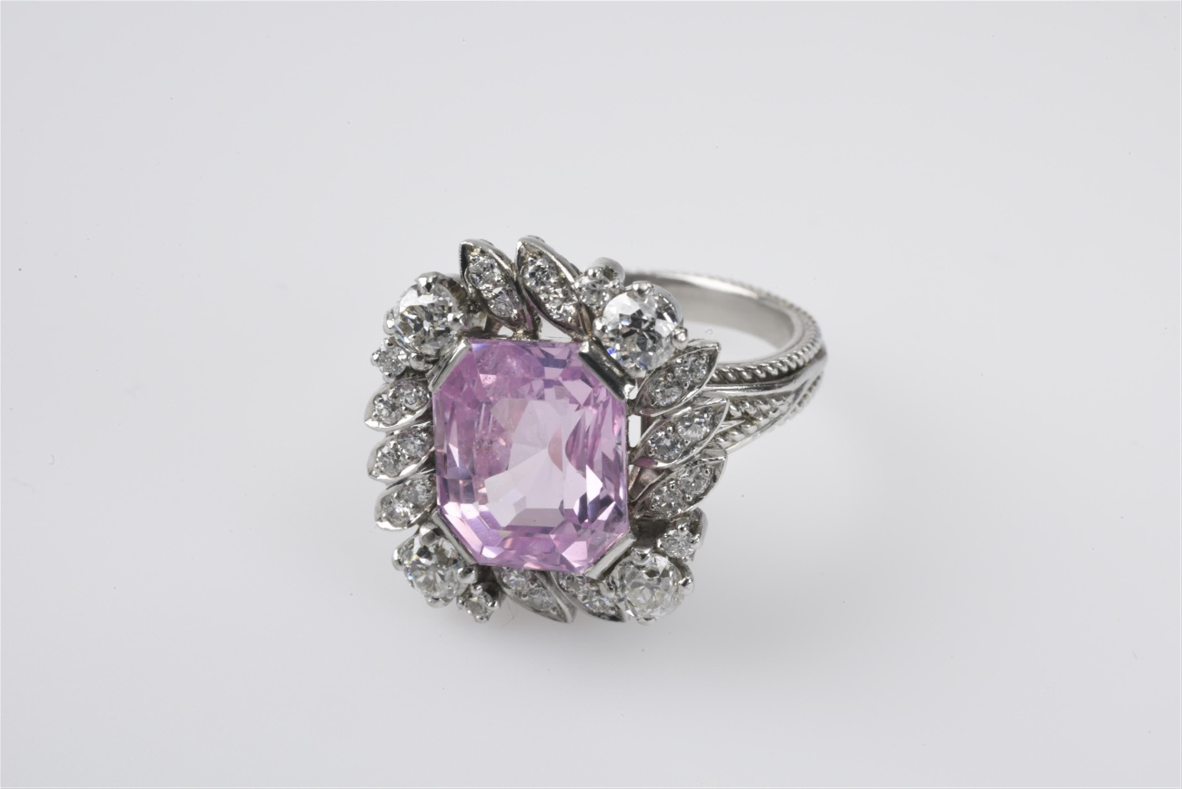 A platinum and pink sapphire cluster ring - image-1