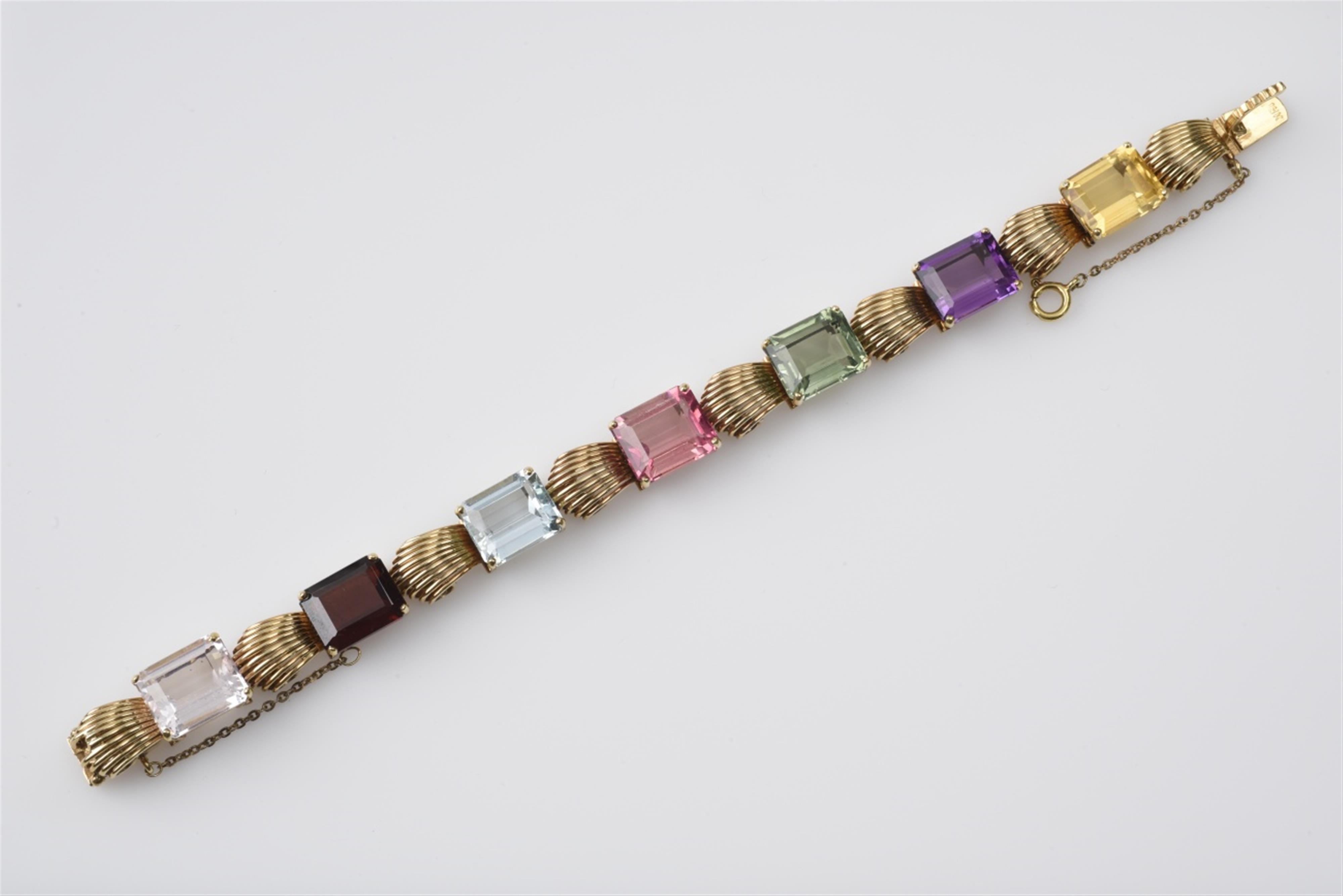 An 18k gold and coloured stone retro bracelet - image-1