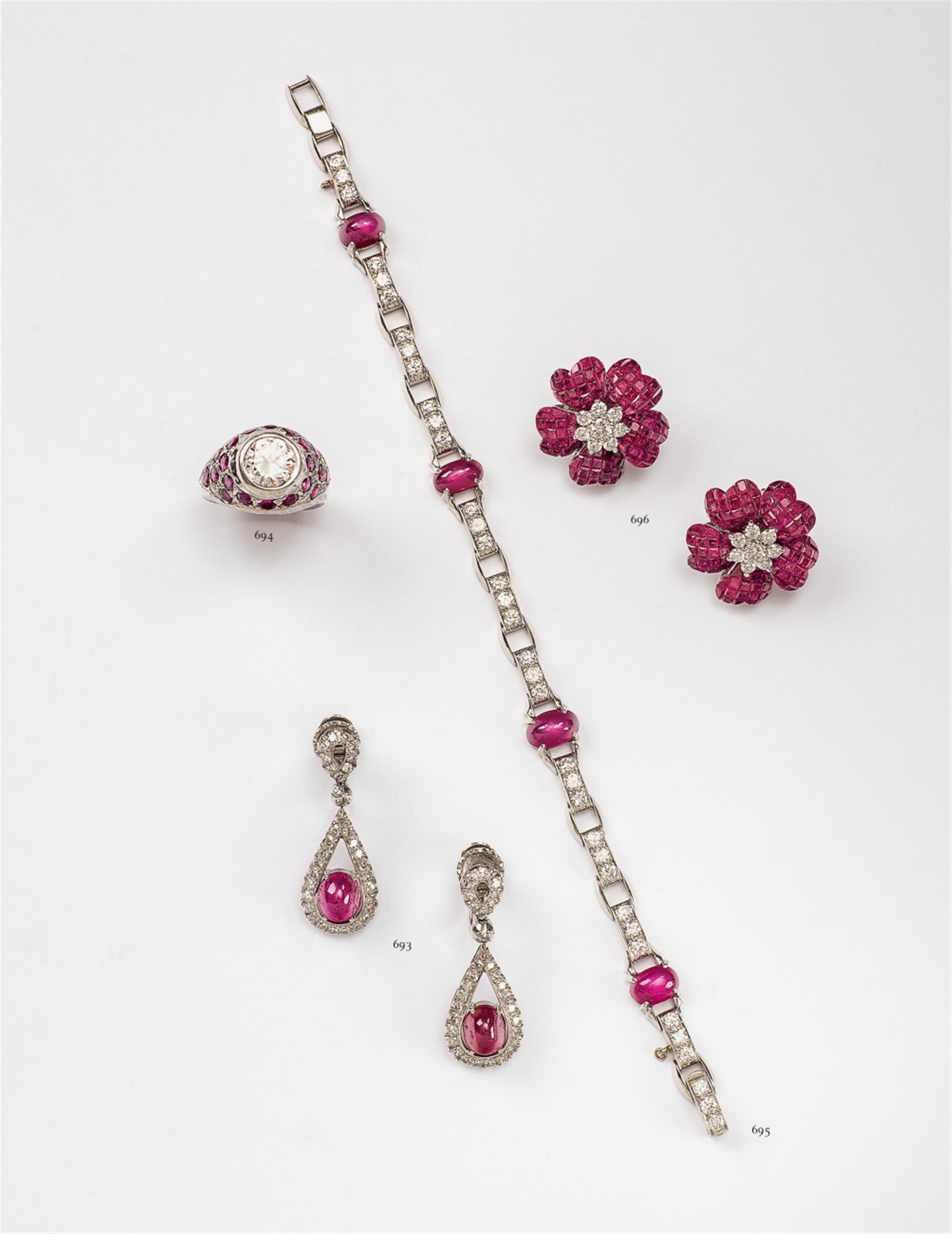 A pair of 18k white gold and ruby pendant earrings - image-2