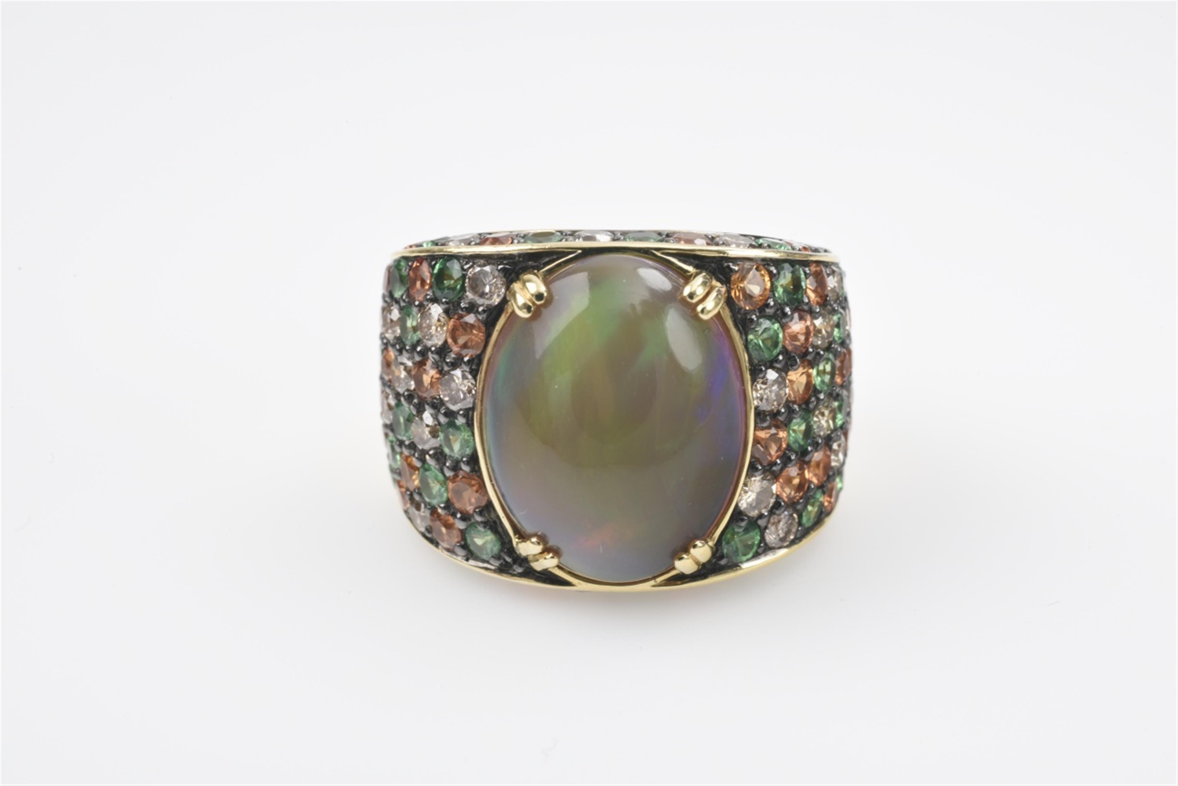 An 18k gold and opal ring - image-1
