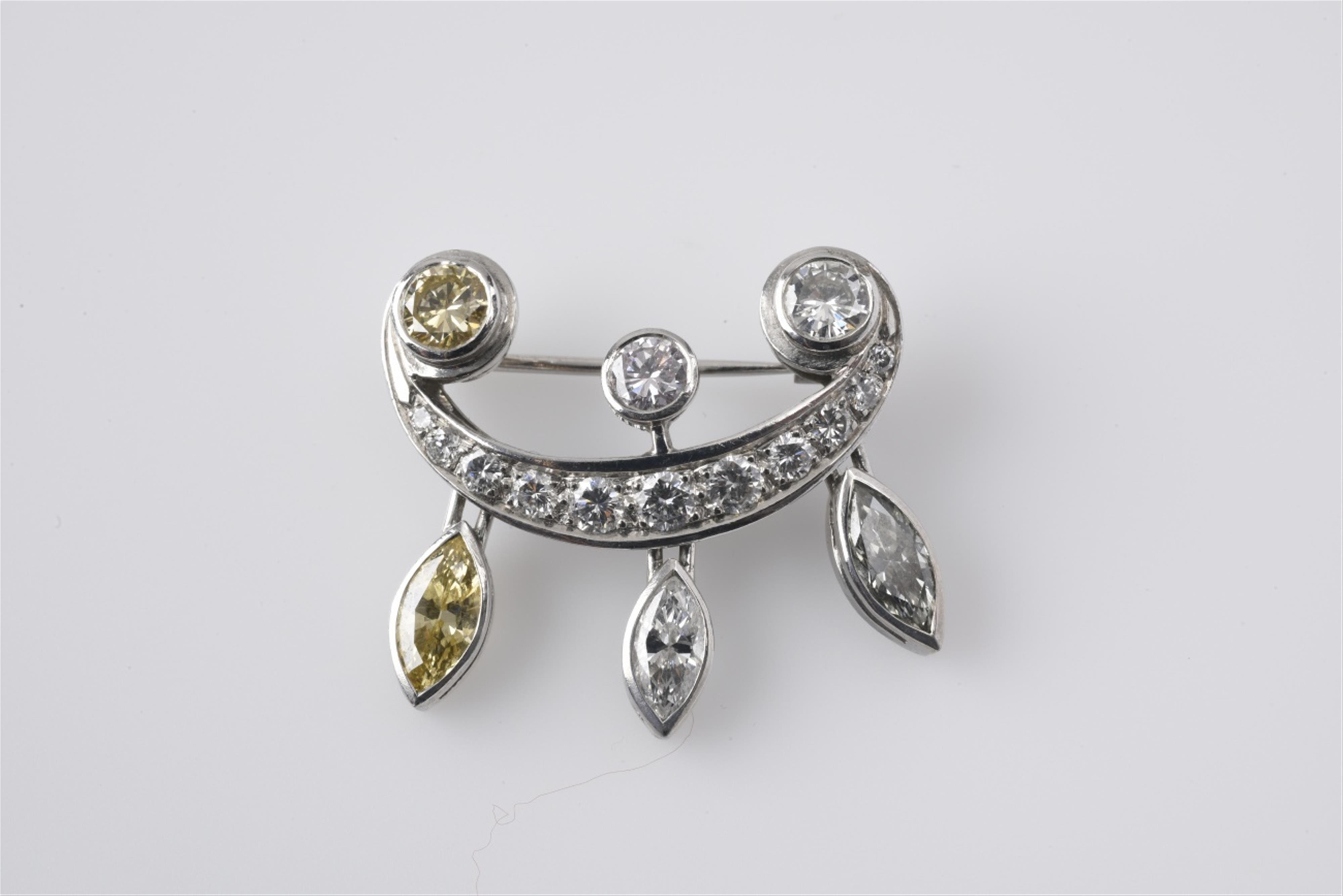 An 18k white gold and fancy diamond brooch - image-1