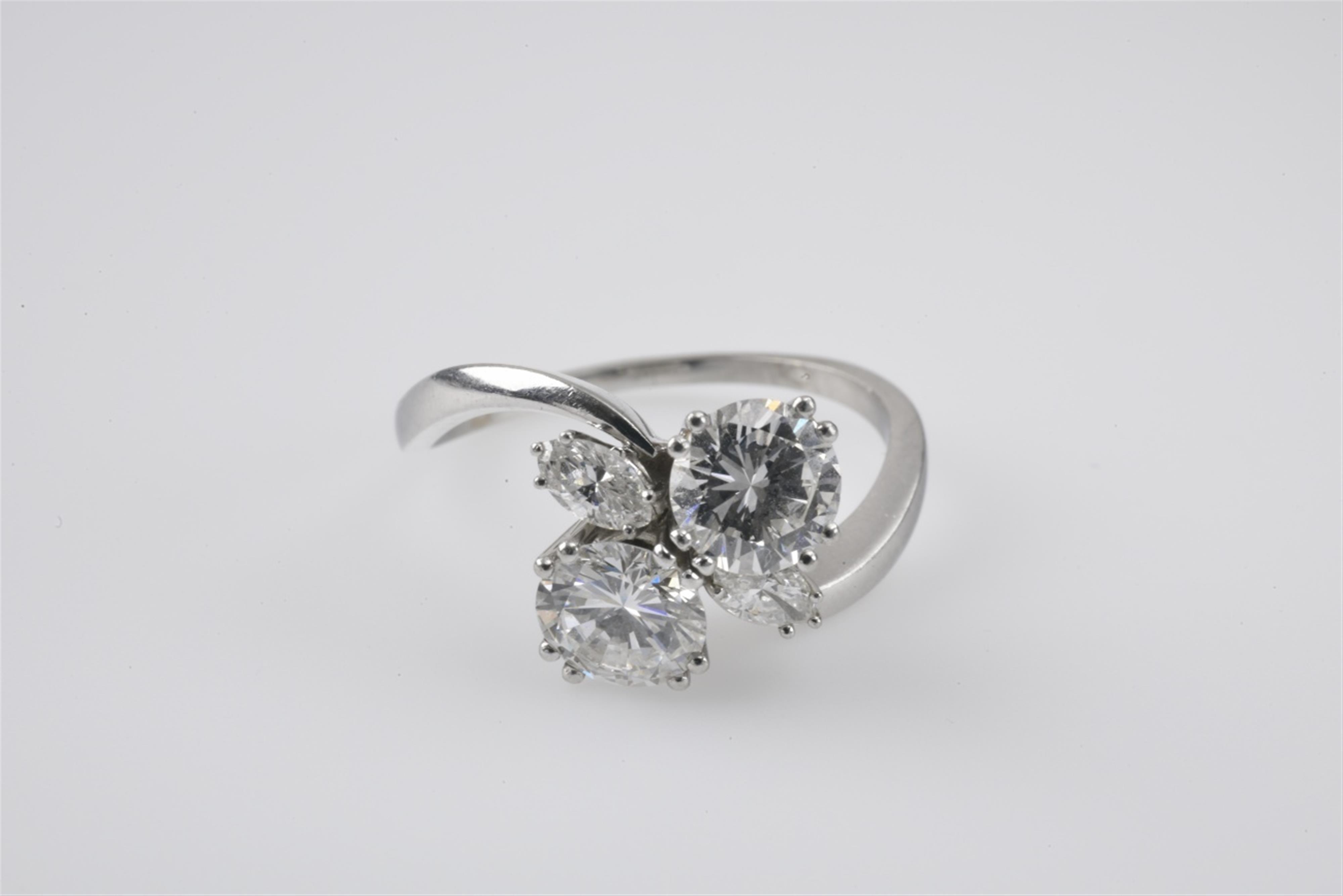 A platinum and diamond toi-et-moi ring - image-1