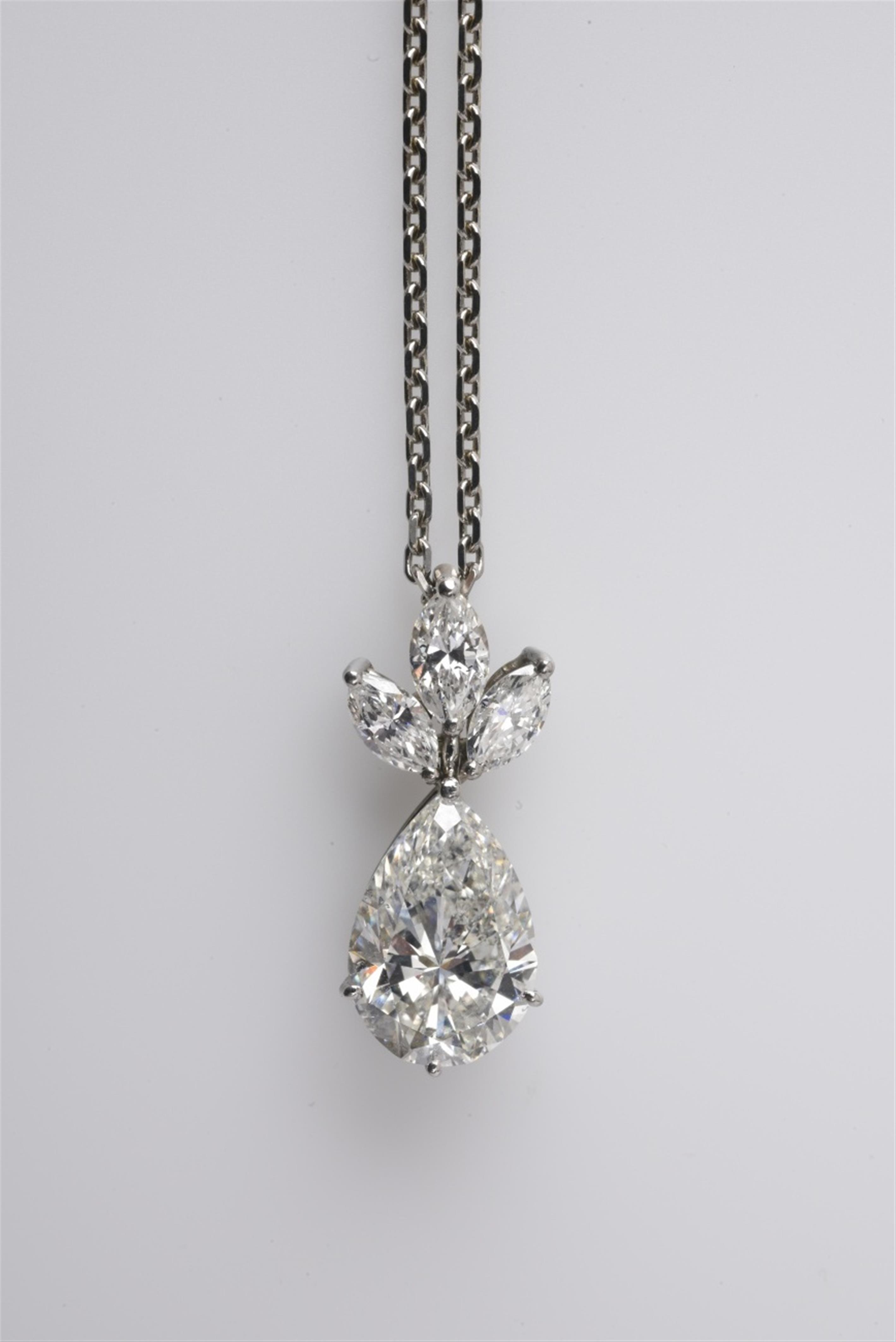 An 18k white gold and diamond pendant - image-1