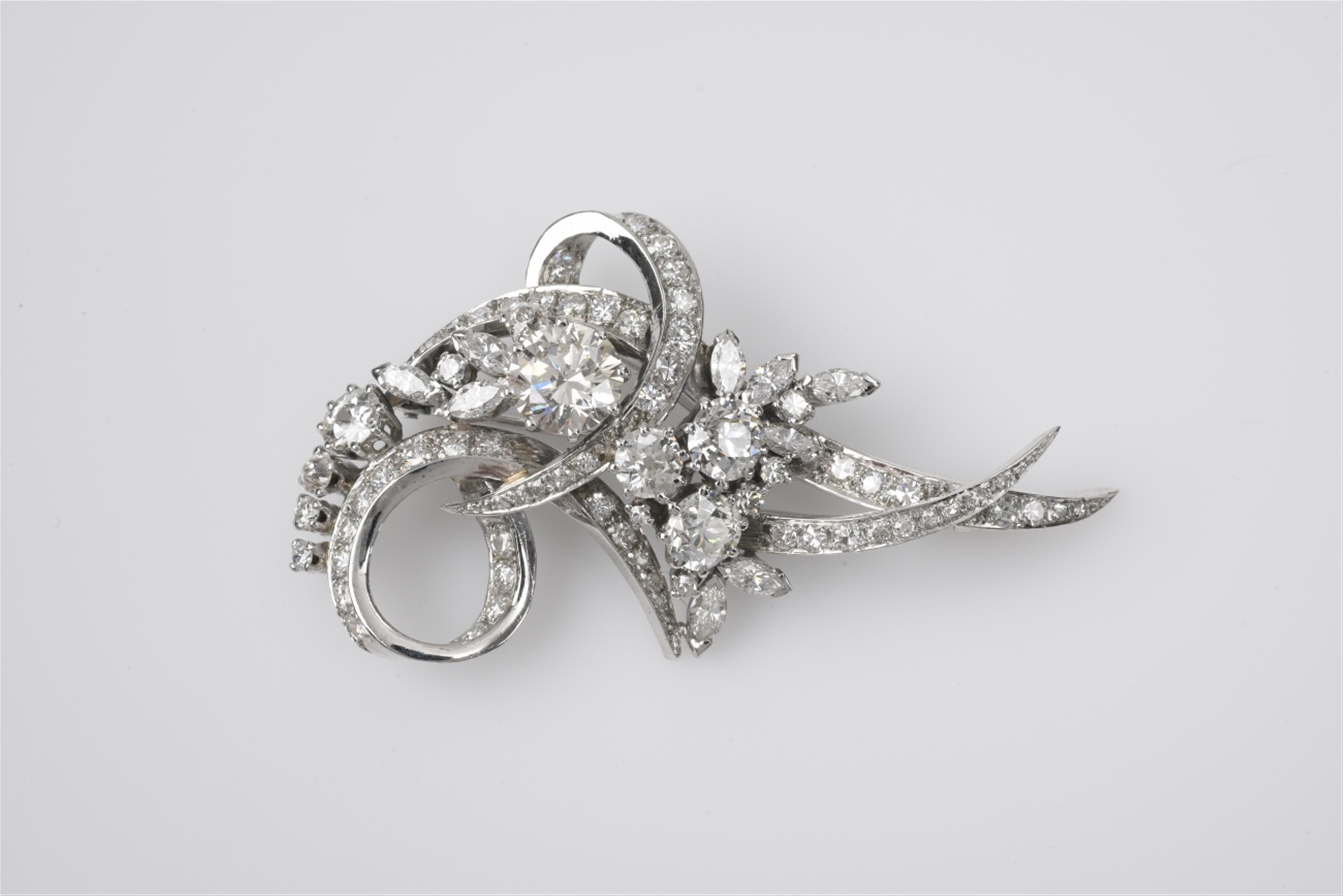 An 18k white gold and diamond brooch - image-1