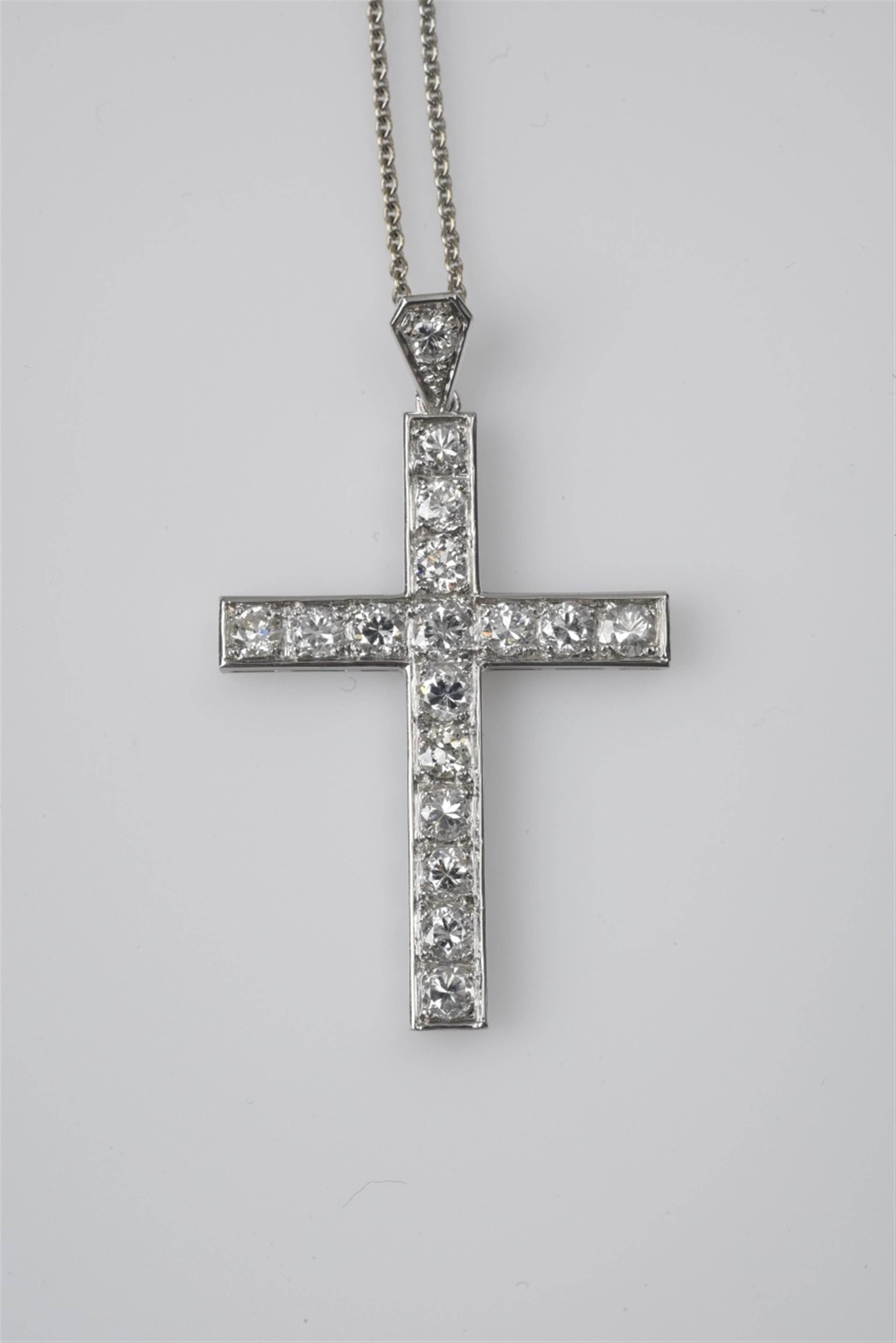 A platinum and diamond cross pendant - image-1