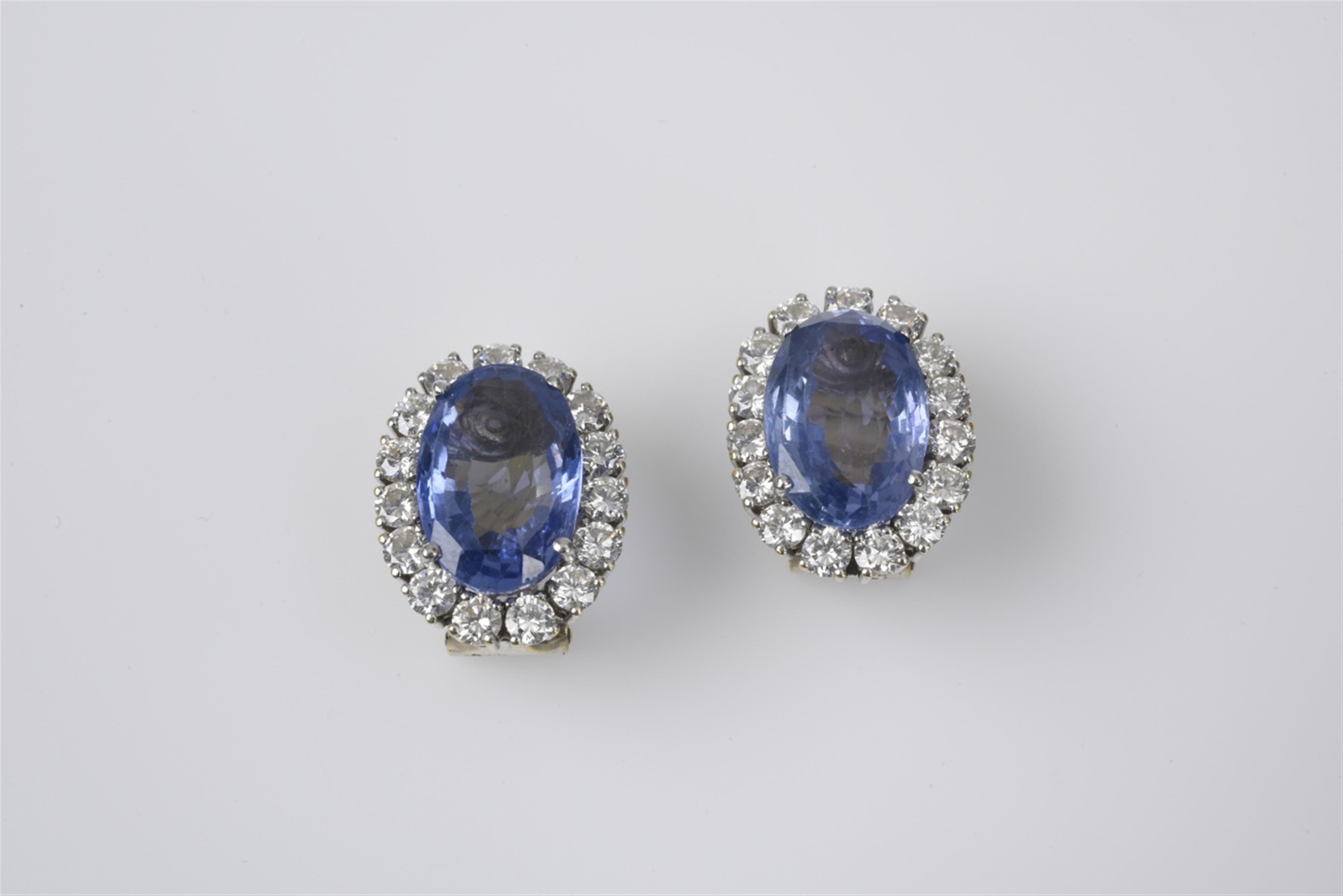 A pair of 18k gold and Ceylon sapphire clip earrings - image-1