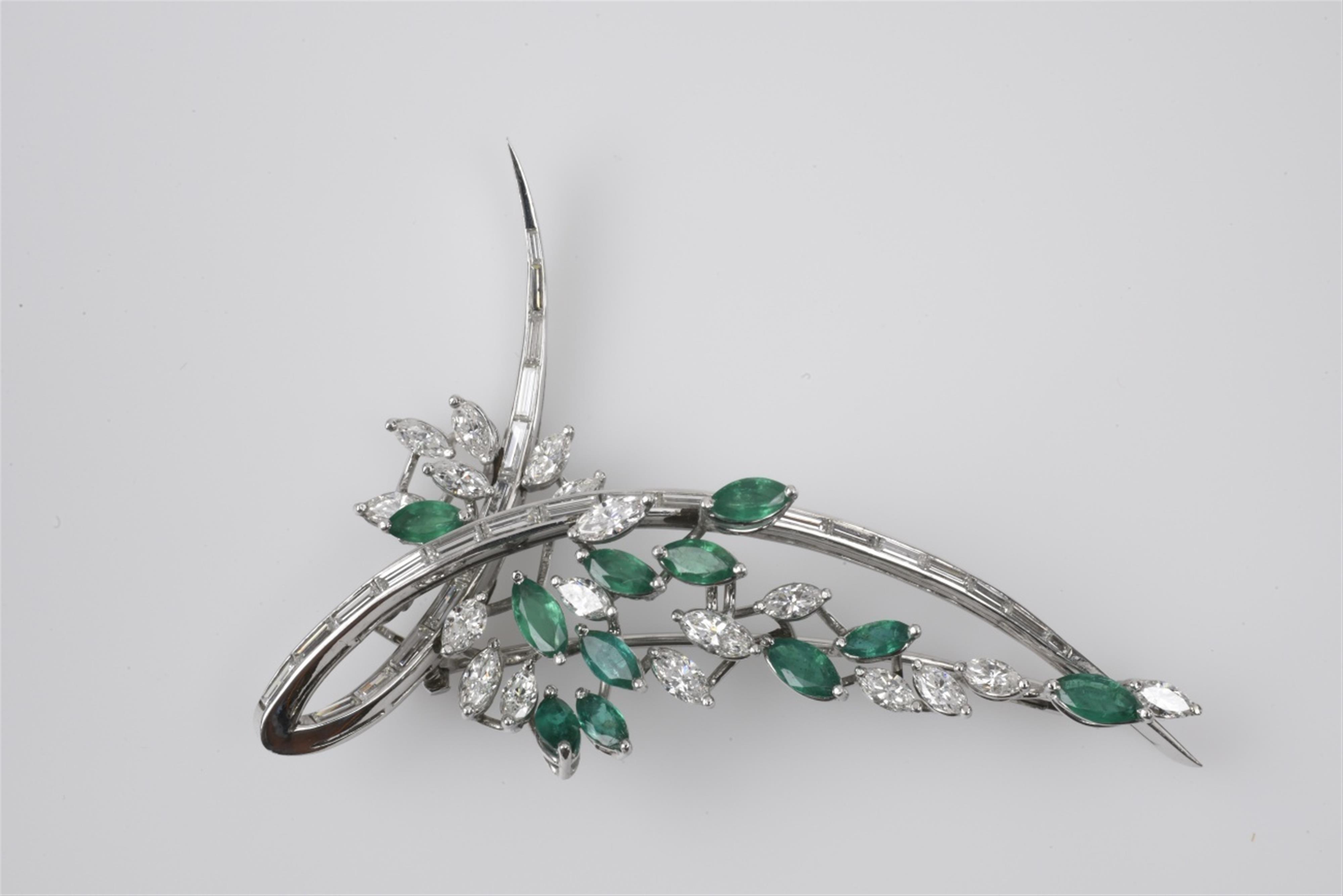 A platinum, emerald, and diamond brooch - image-1