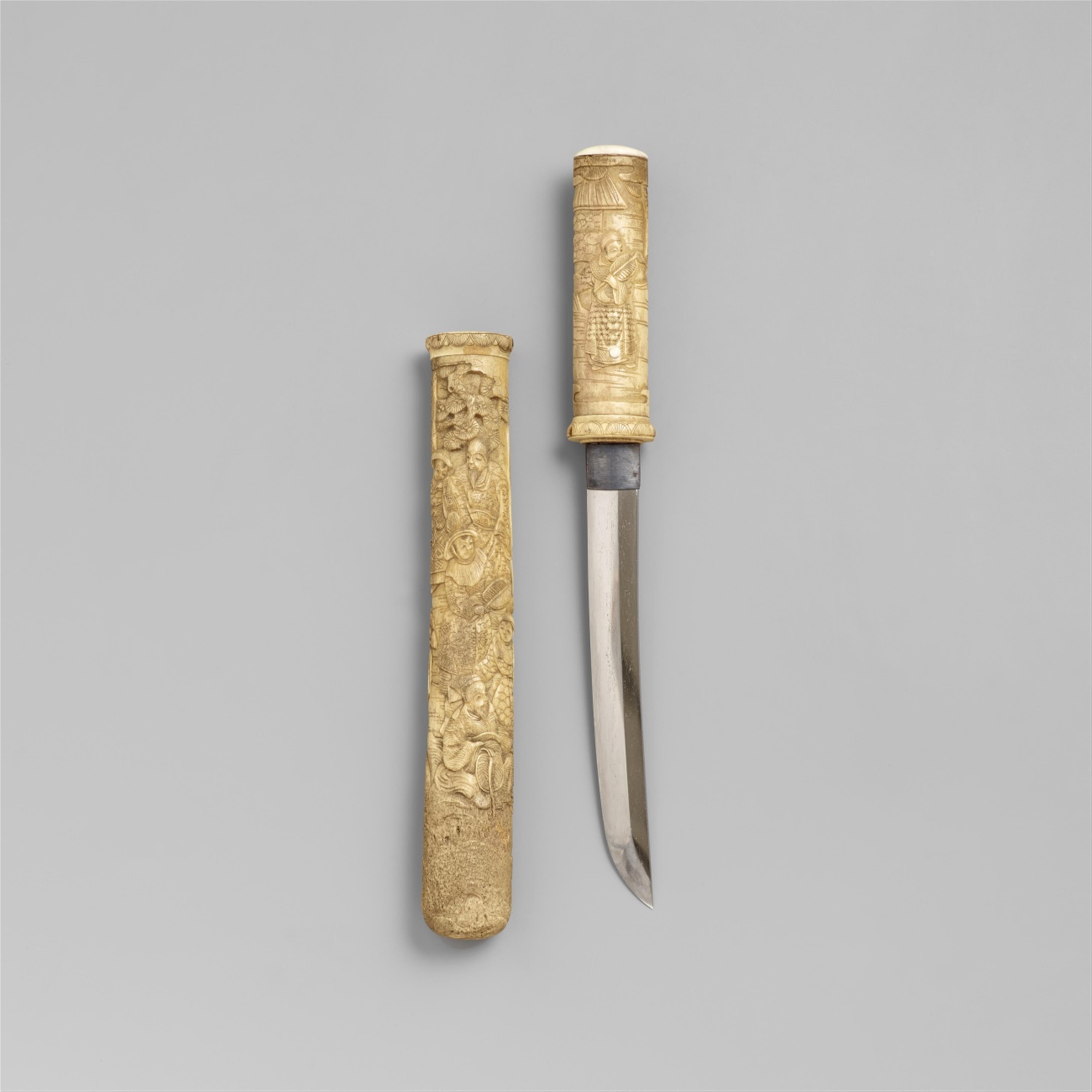 A dagger with a carved bone sheath. Late 19th century - image-1