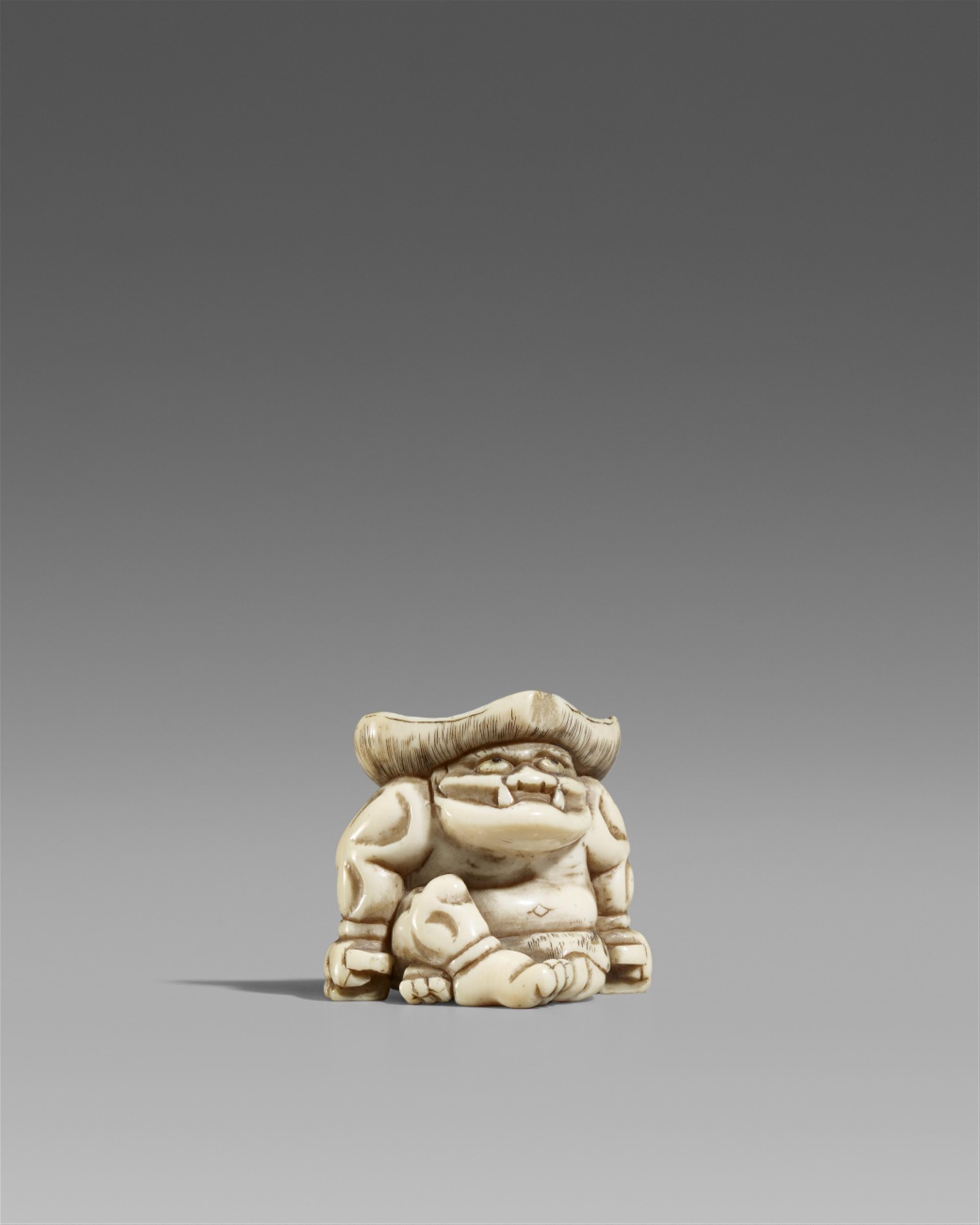 An ivory netsuke of a seated oni. Late 18th/early 19th century - image-1