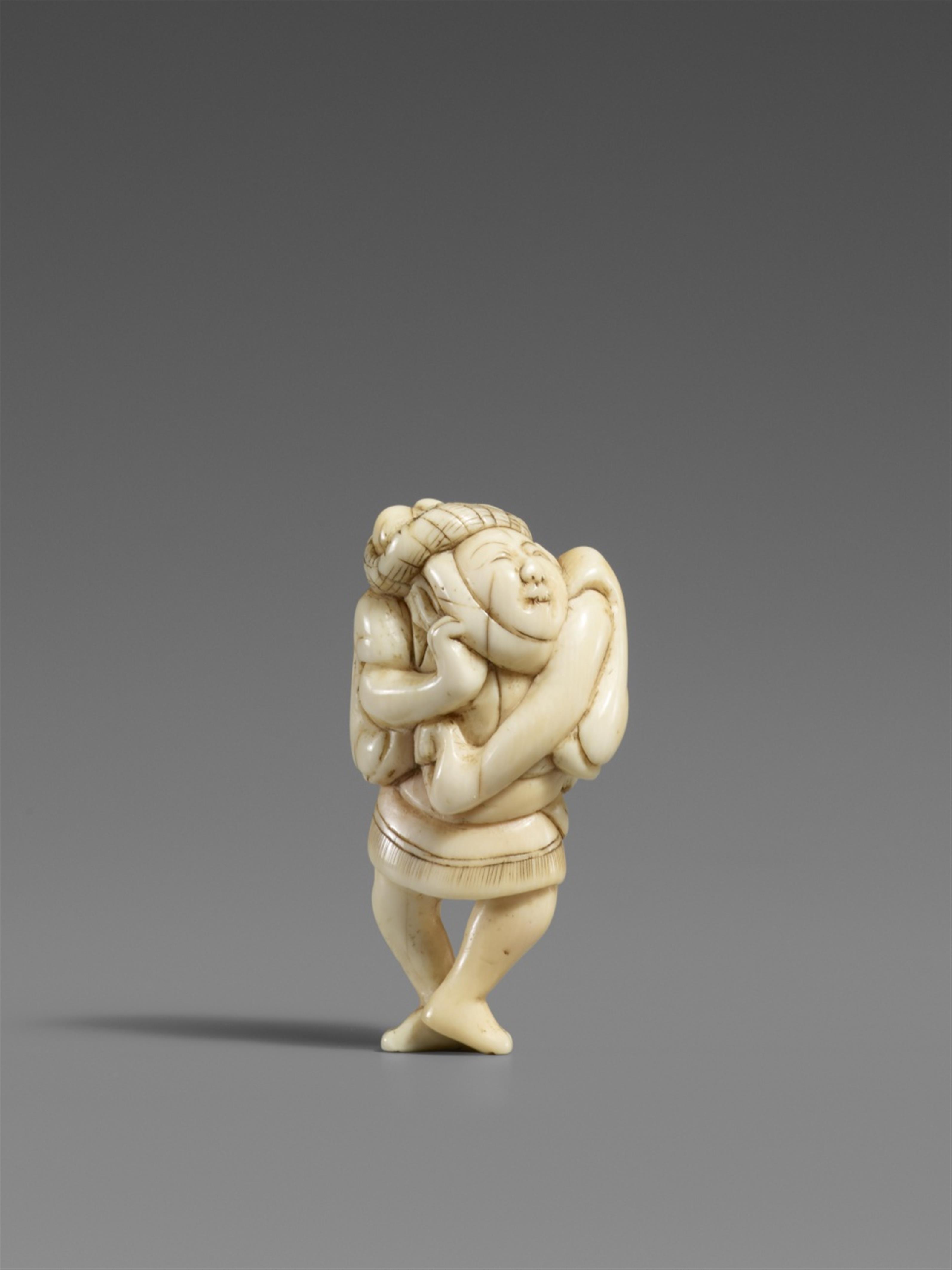 An ivory netsuke of a sparrow-dancer. 19th century - image-1