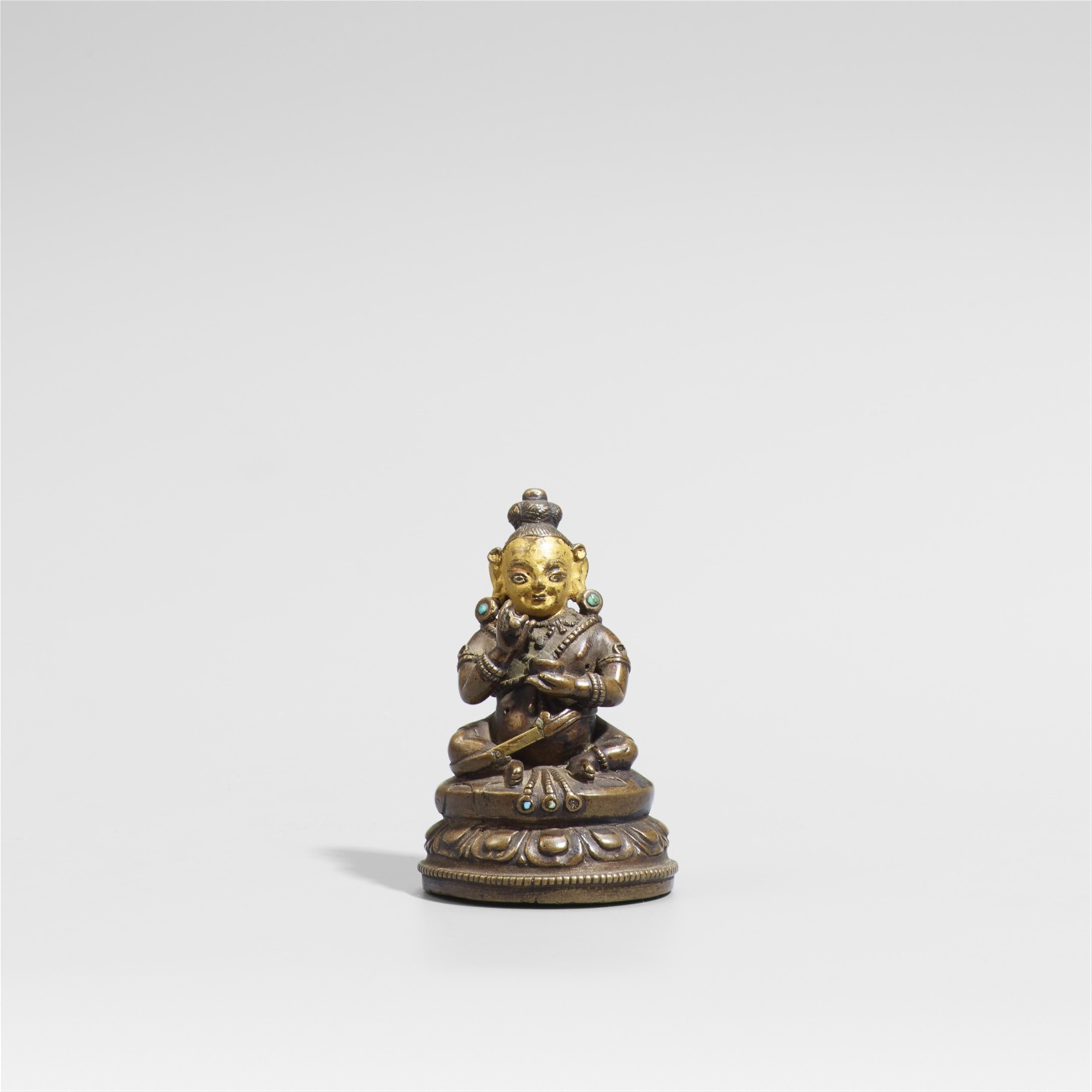 A small Tibetan copper alloy figure of a mahasiddha. 16th/17th century - image-1