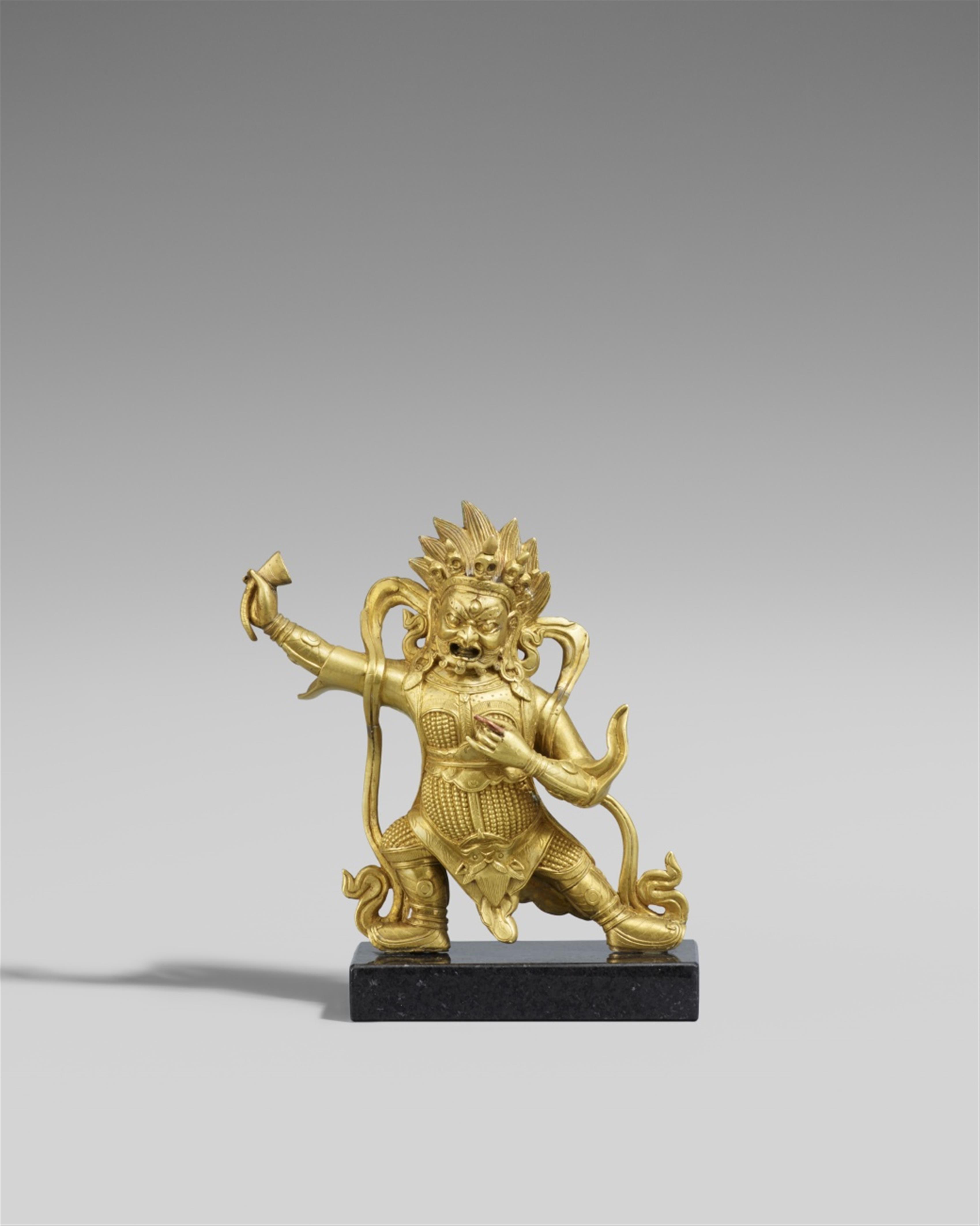 A Sinotibetan gilt bronze figure of Begtse. 18th/19th century - image-1