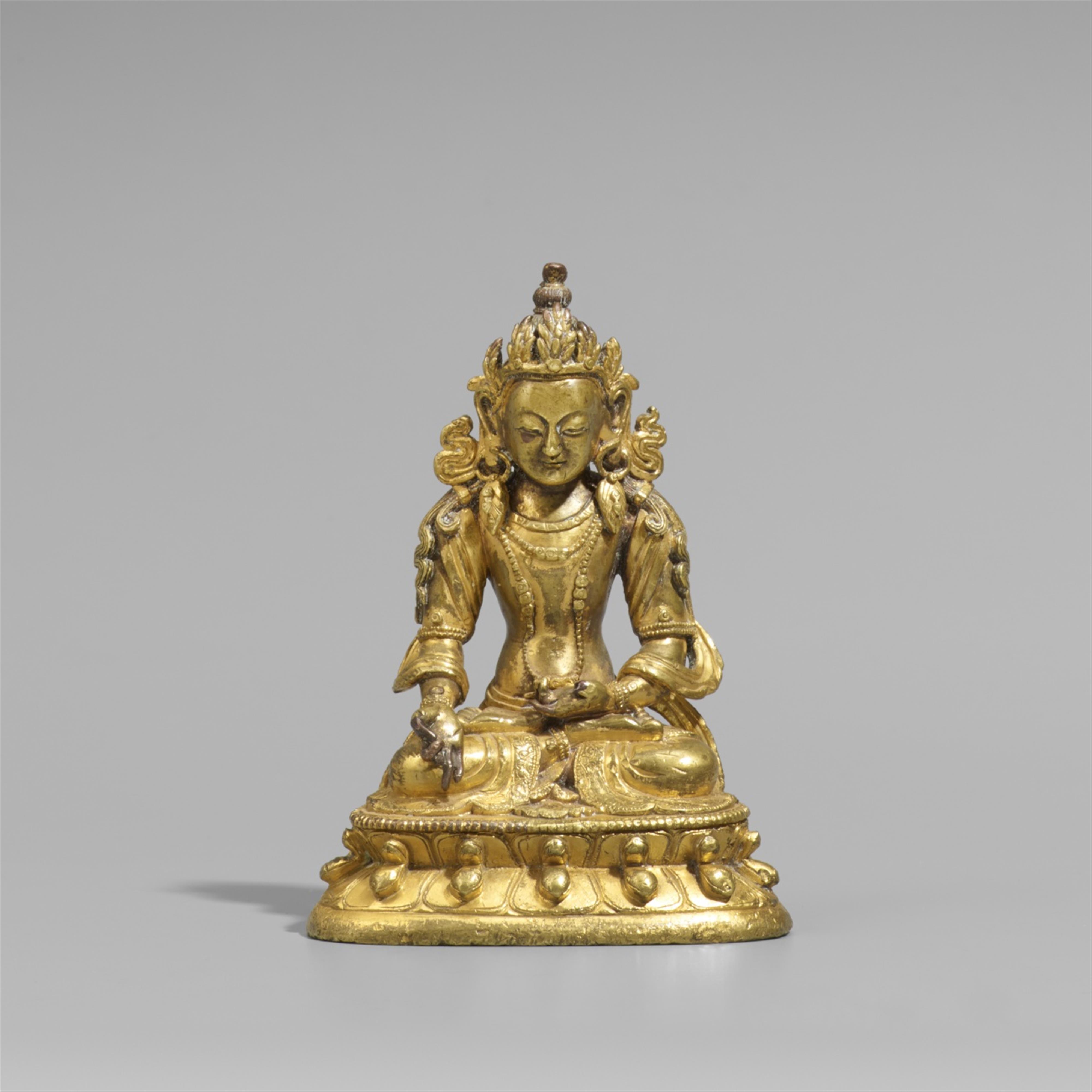 A Sinotibetan gilt copper alloy figure of Buddha Ratnasambhava. 19th century - image-1