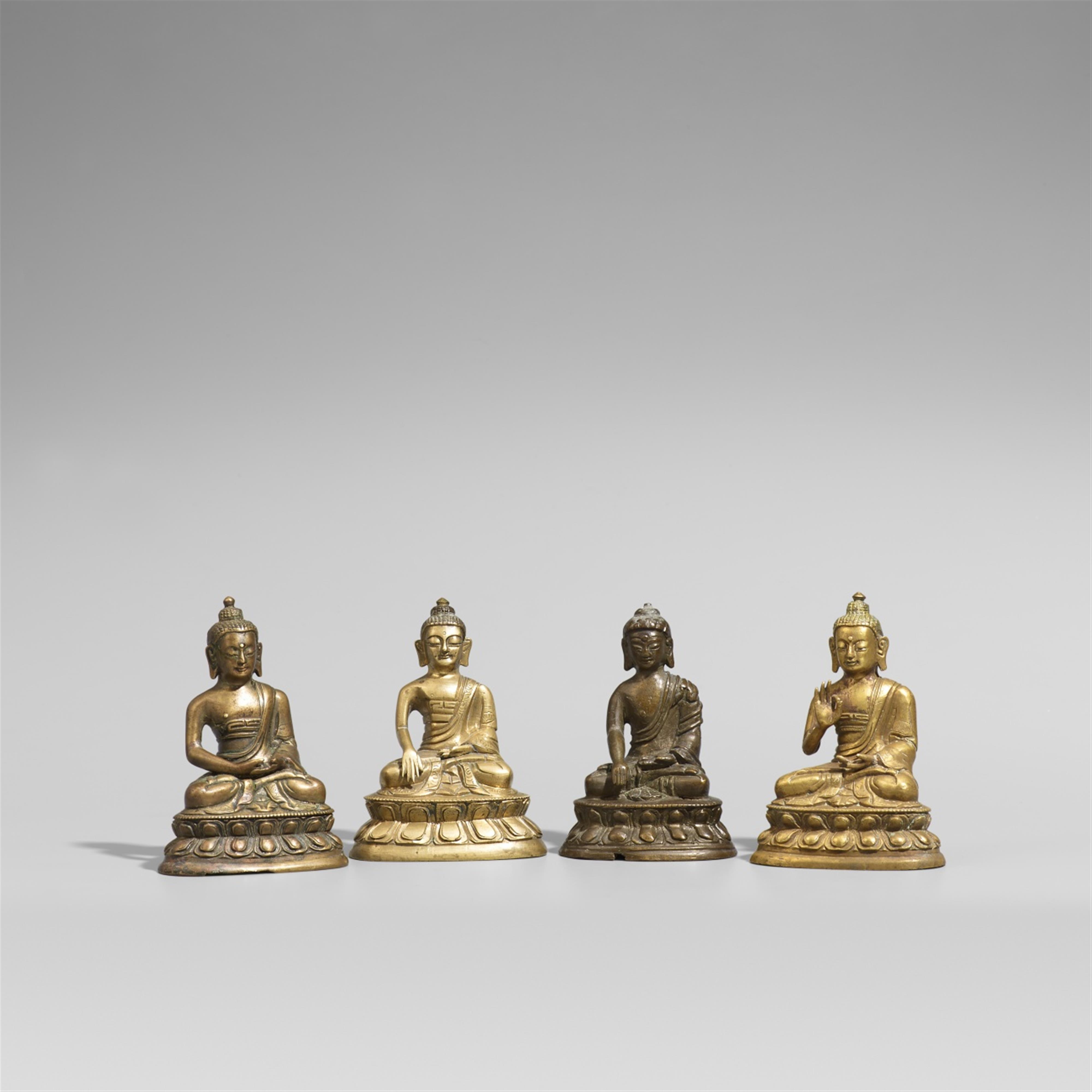 Four Tibetan copper alloy and brass figures of Buddha. Late 19th century - image-1